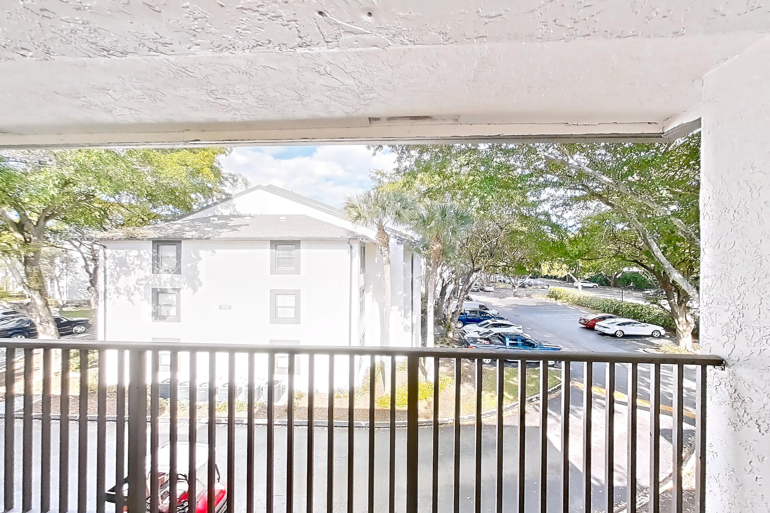 Living room balcony, Apartment 10-032 at Cortland at the Hammocks
