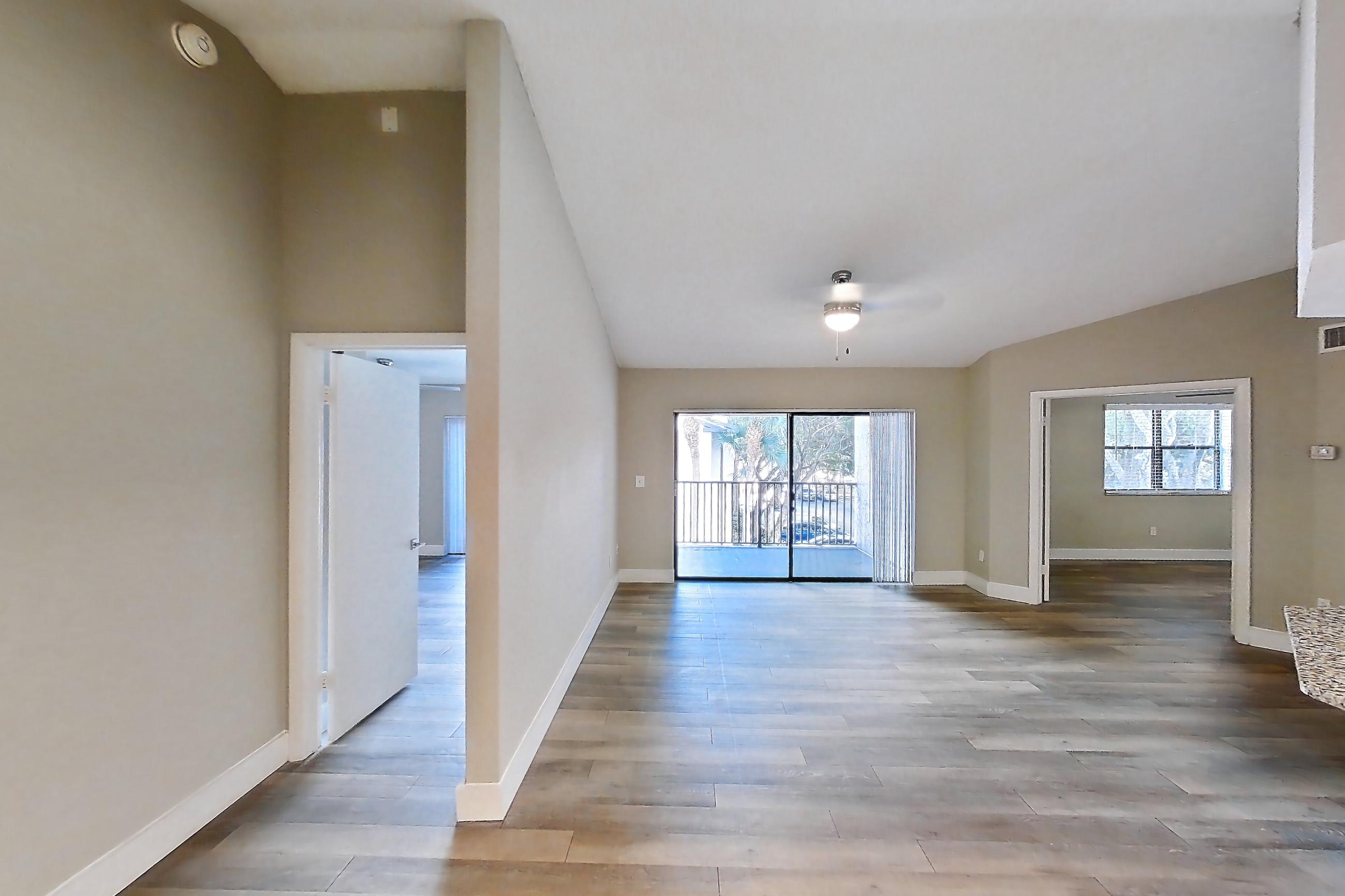 Living space in Apartment 10-032 at Cortland at the Hammocks, C1R - Sycamore - W floor plan