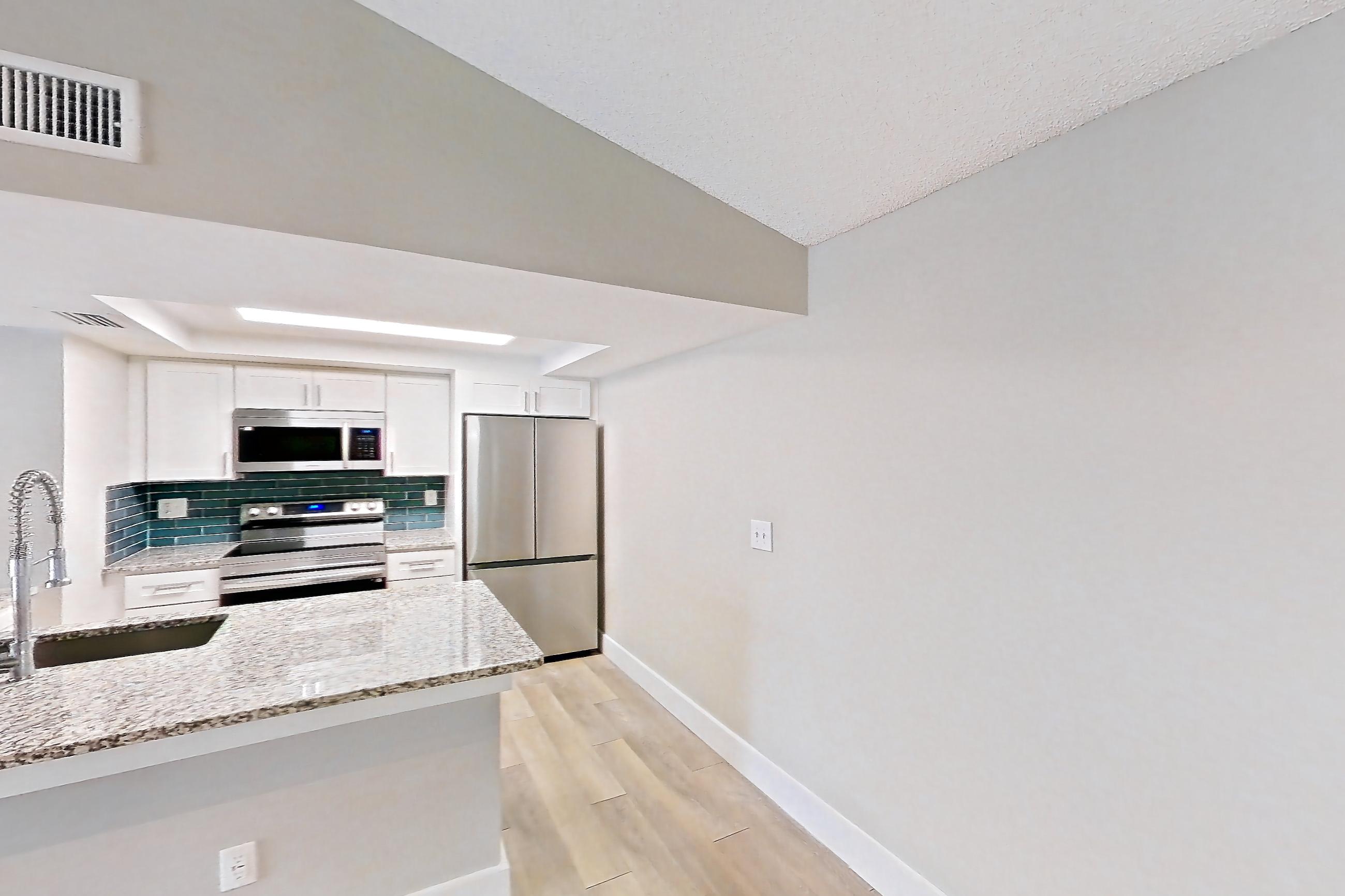 Living space in Apartment 10-032 at Cortland at the Hammocks, C1R - Sycamore - W floor plan