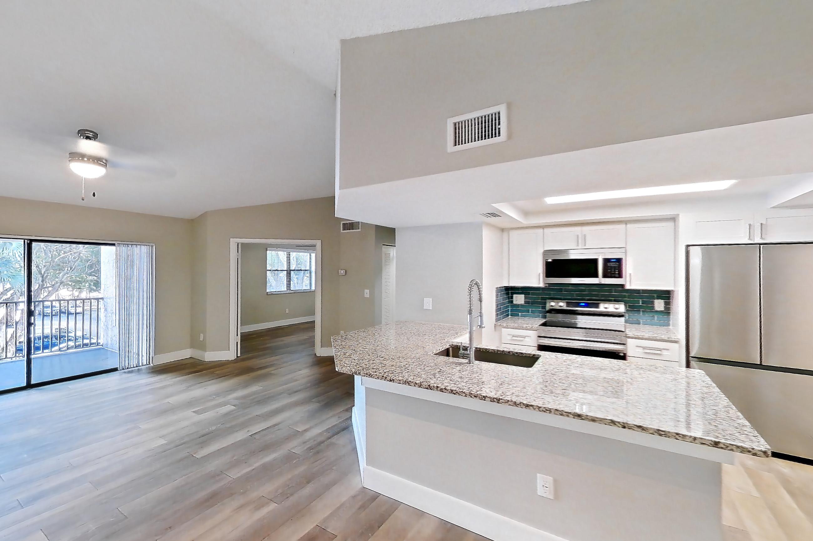 Living space in Apartment 10-032 at Cortland at the Hammocks, C1R - Sycamore - W floor plan