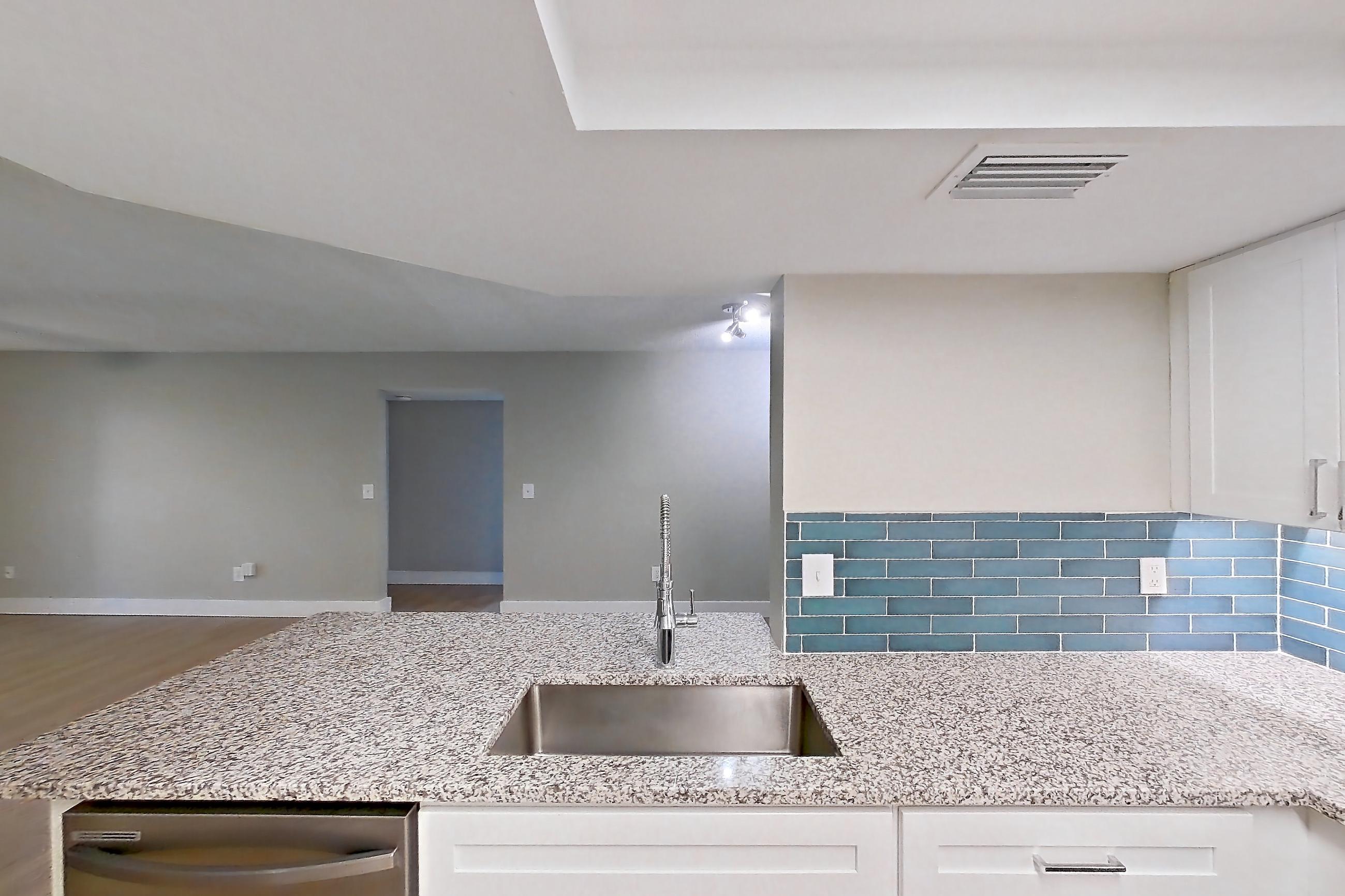 Kitchen in Apartment 10-024 at Cortland at the Hammocks, C2R - Wax Myrtle - W floor plan