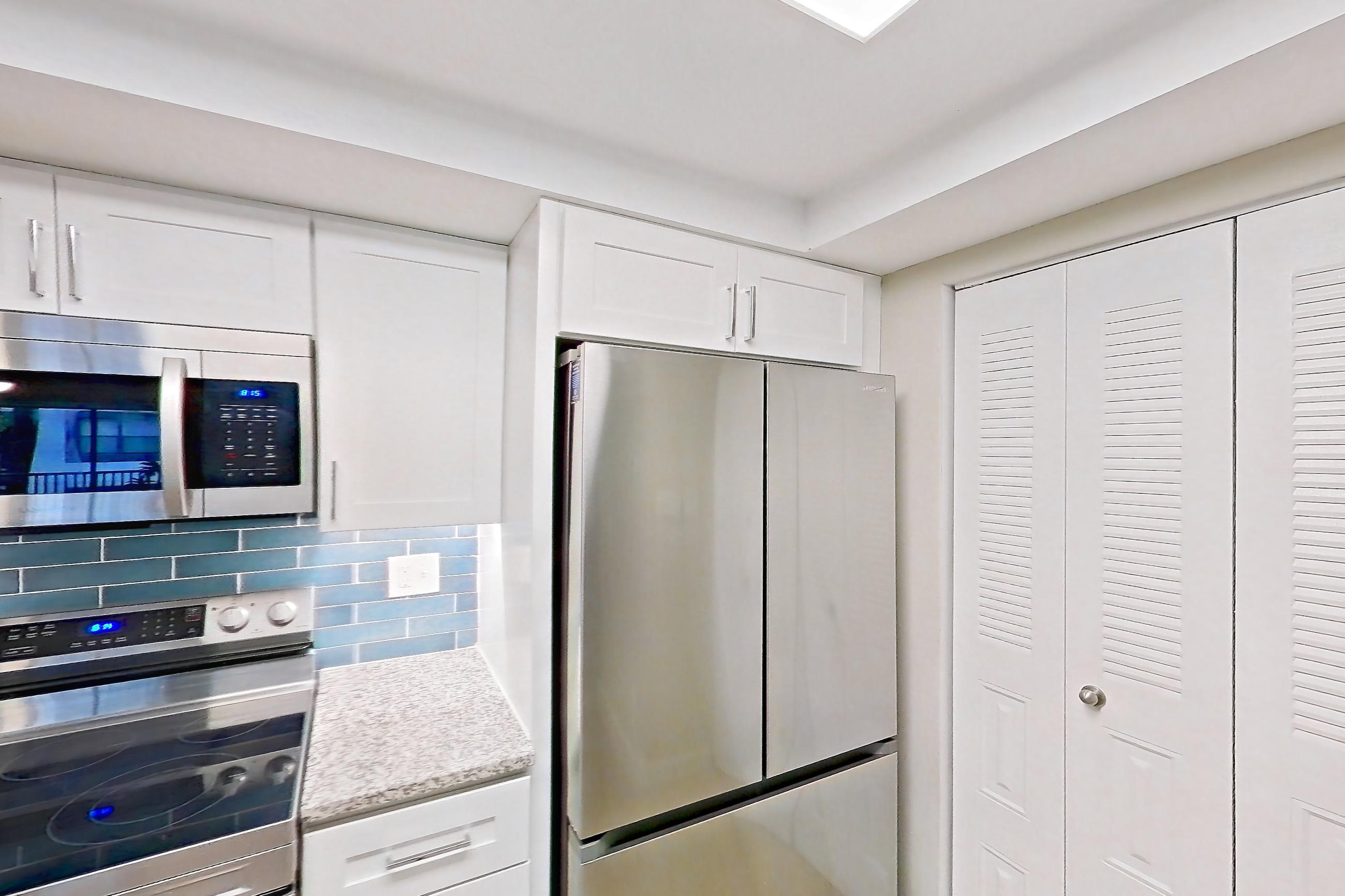 Kitchen in Apartment 10-024 at Cortland at the Hammocks, C2R - Wax Myrtle - W floor plan