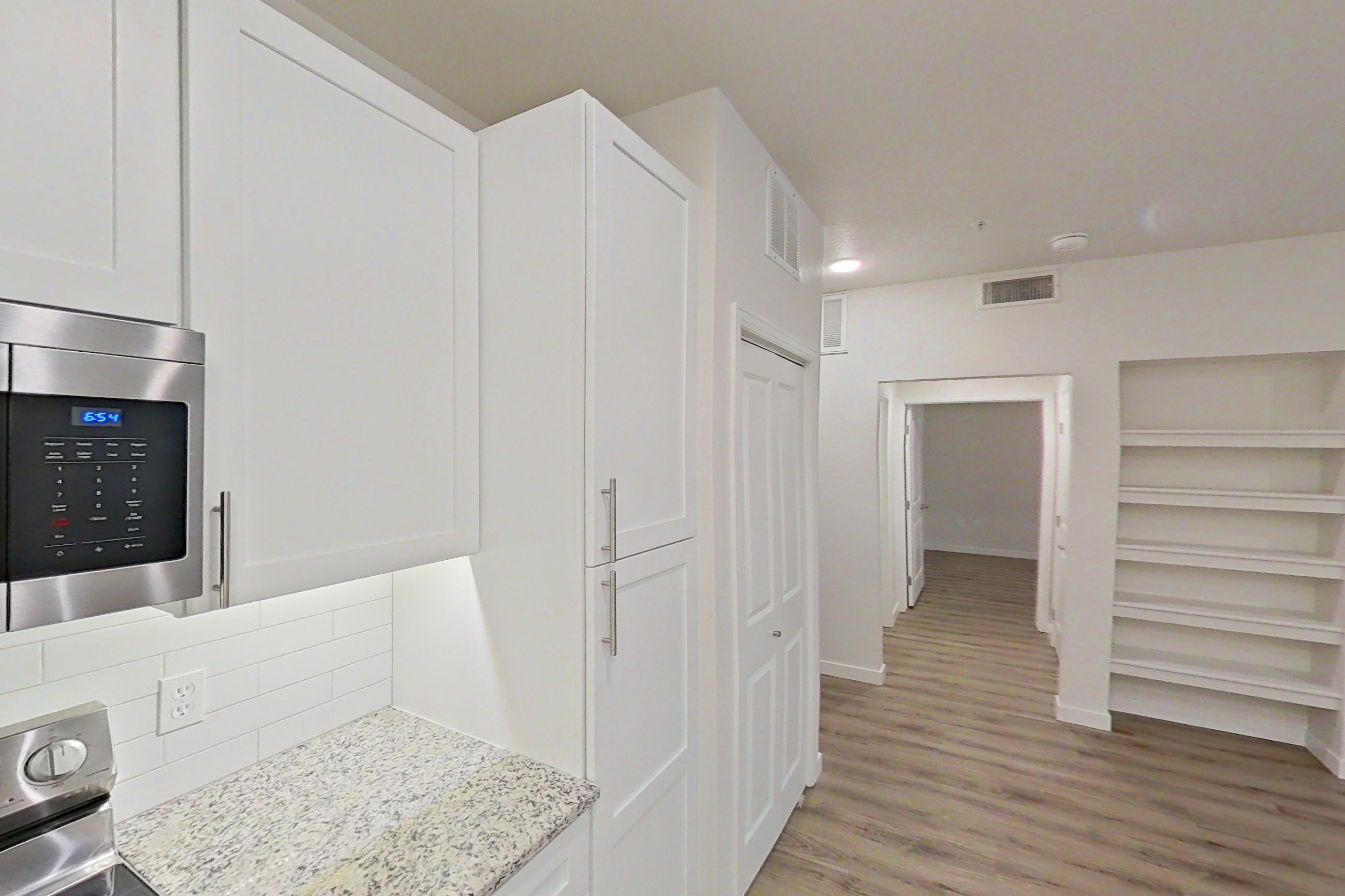 Kitchen in Apartment c-131 at Cortland Belmar, A14R floor plan