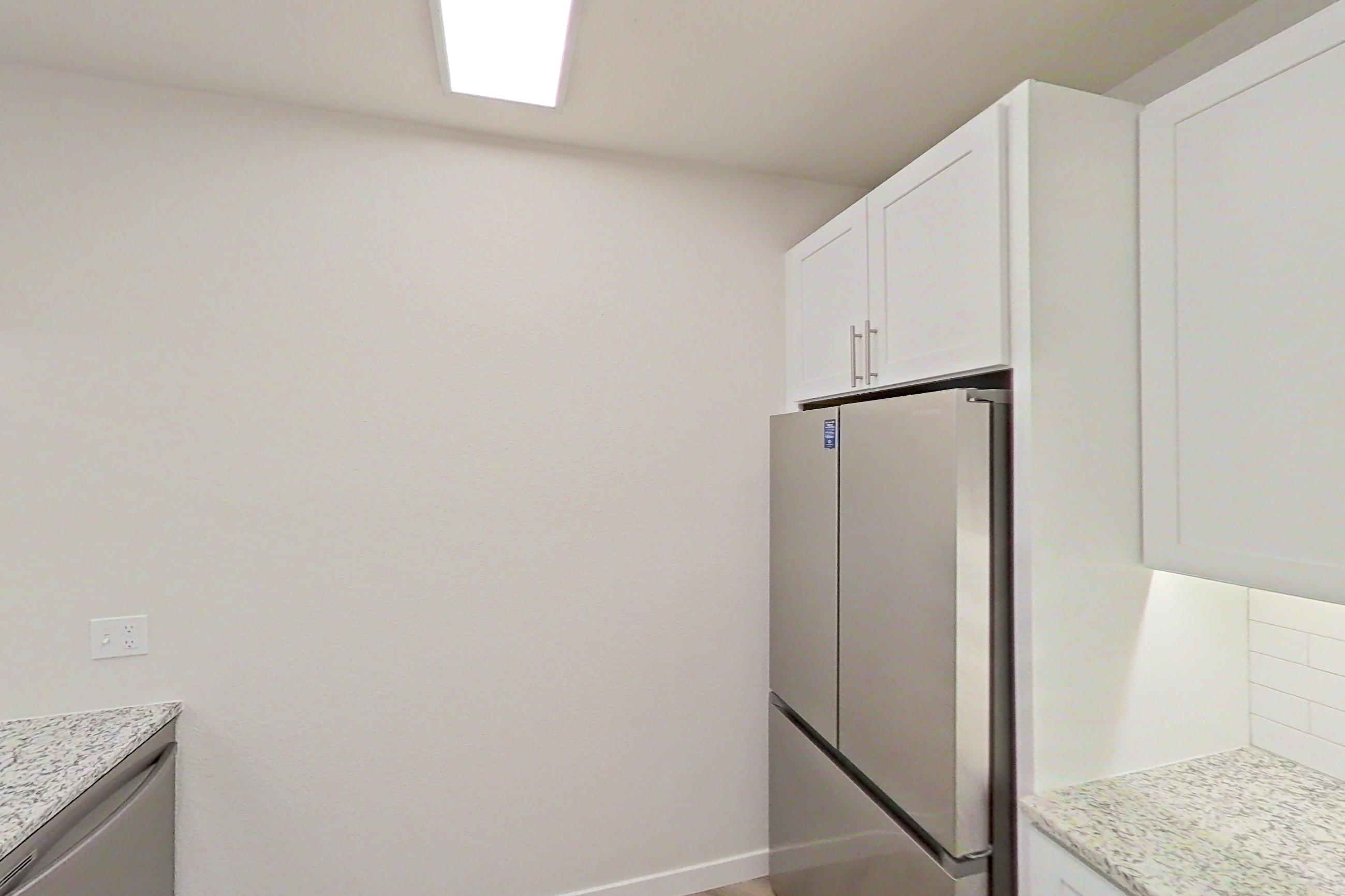 Kitchen in Apartment c-131 at Cortland Belmar, A14R floor plan