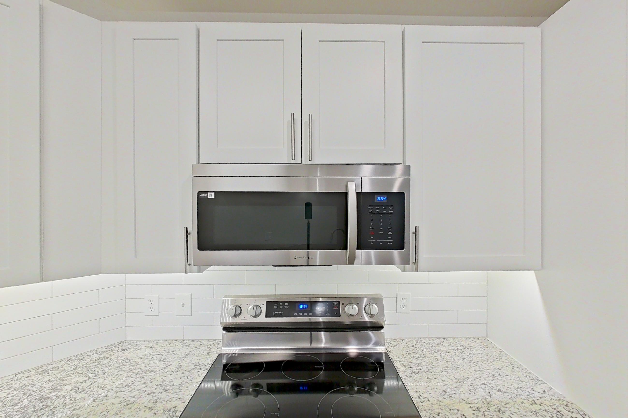 Kitchen in Apartment c-131 at Cortland Belmar, A14R floor plan