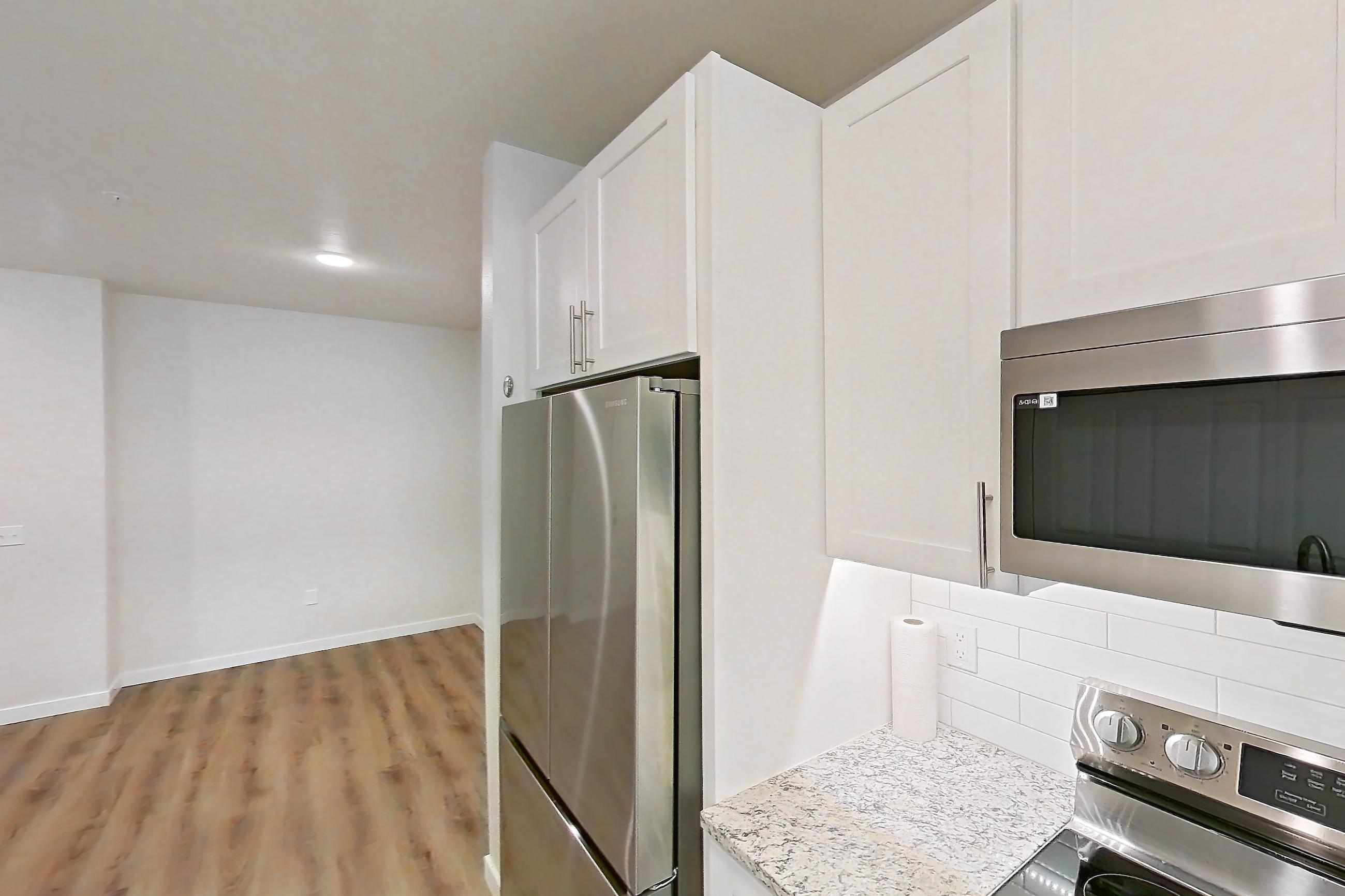 Kitchen in Apartment a-309 at Cortland Belmar, A24R floor plan