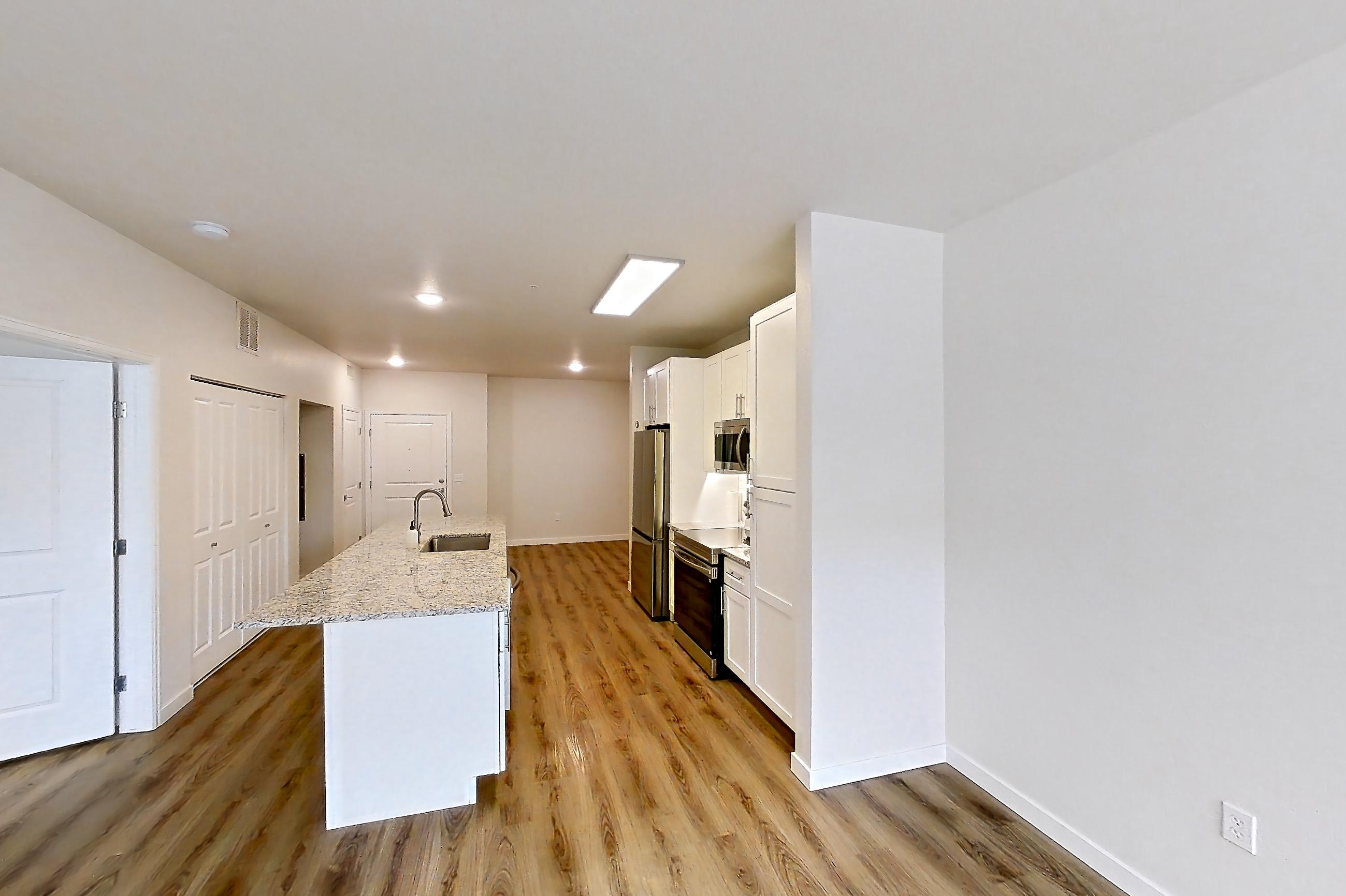 Living space in Apartment a-309 at Cortland Belmar, A24R floor plan