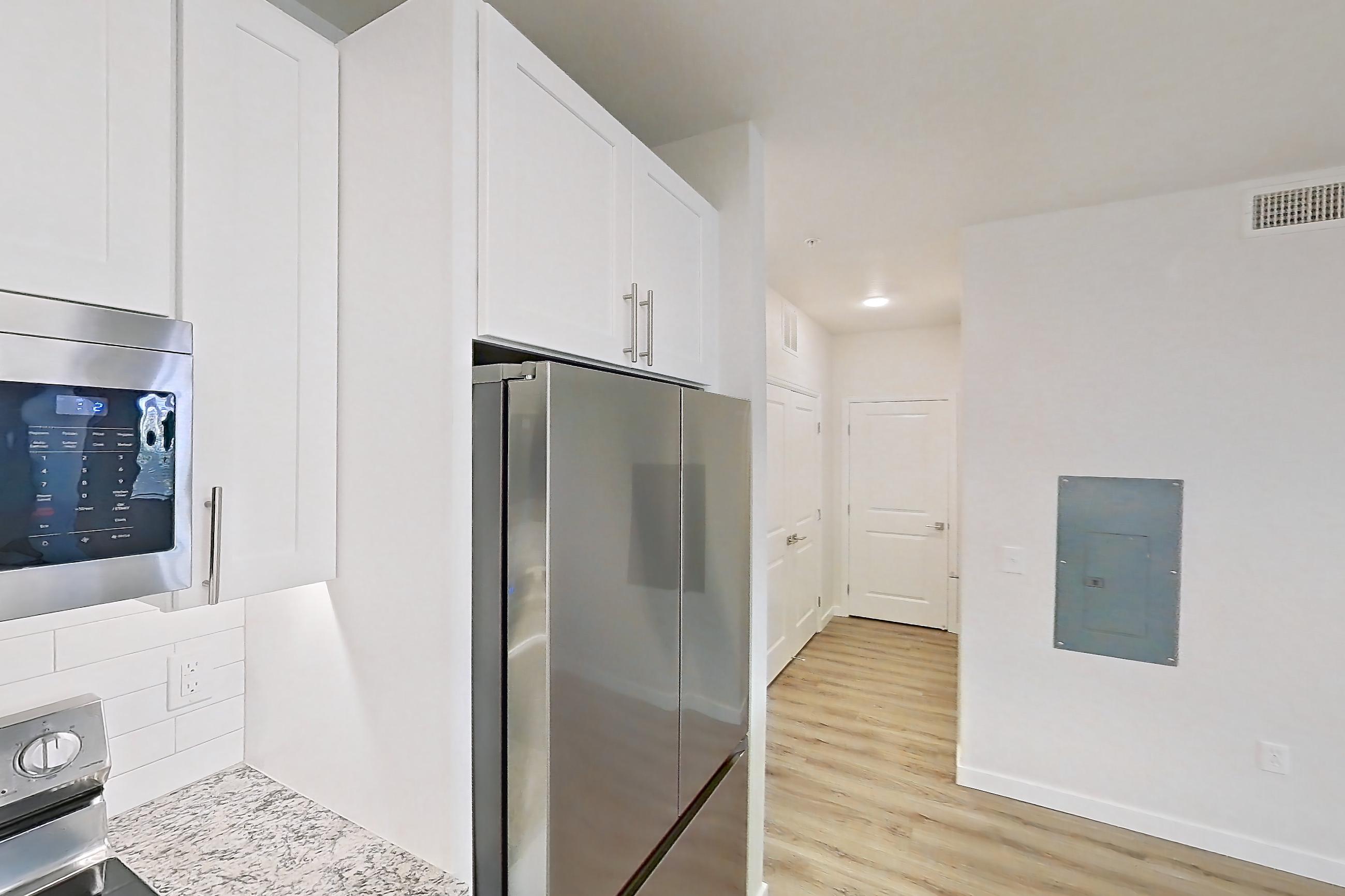 Kitchen in Apartment a-212 at Cortland Belmar, A28R floor plan