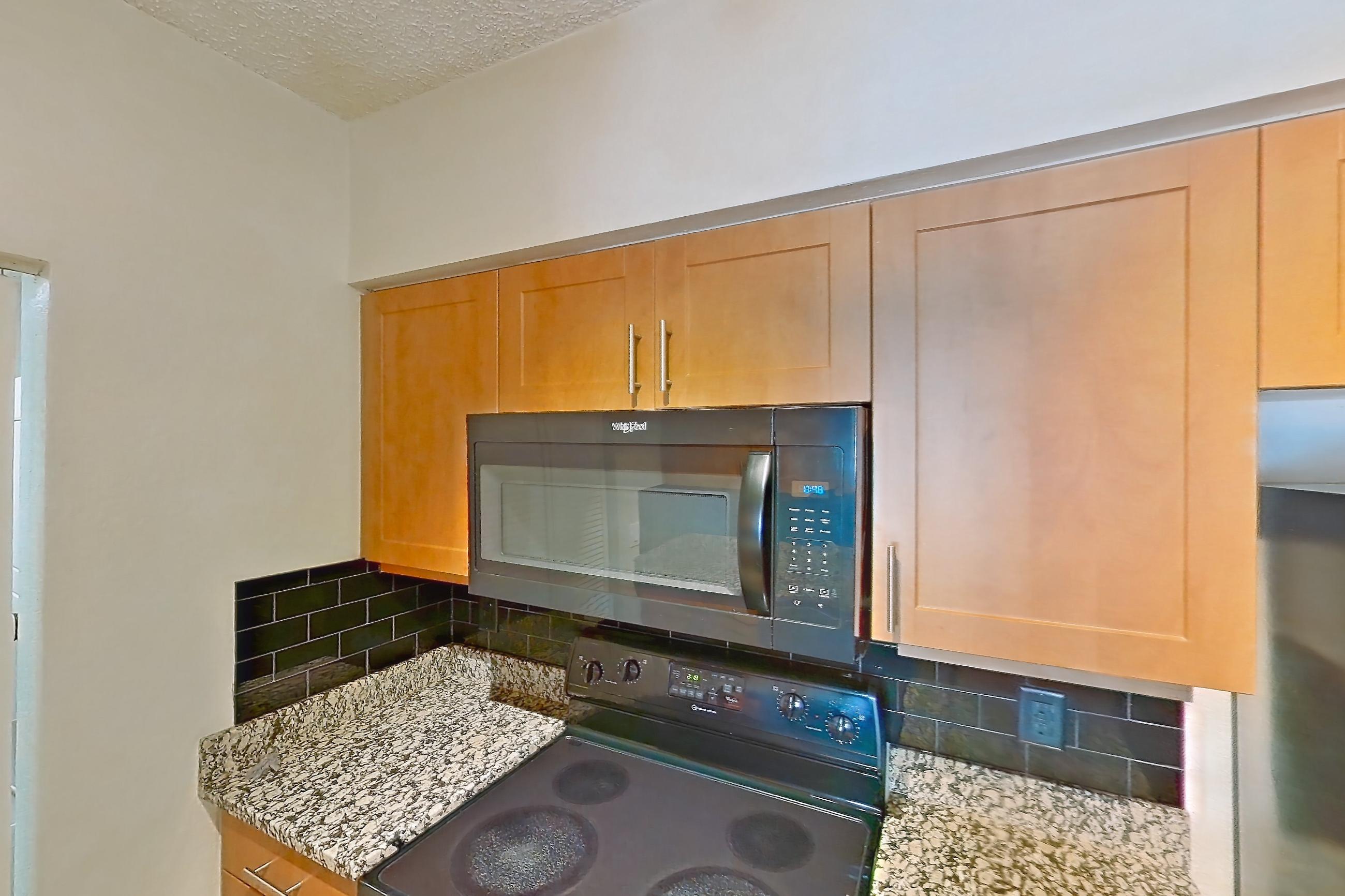 Kitchen in Apartment 565238 at Cortland Bayport, A4 - Coastal South 1 floor plan
