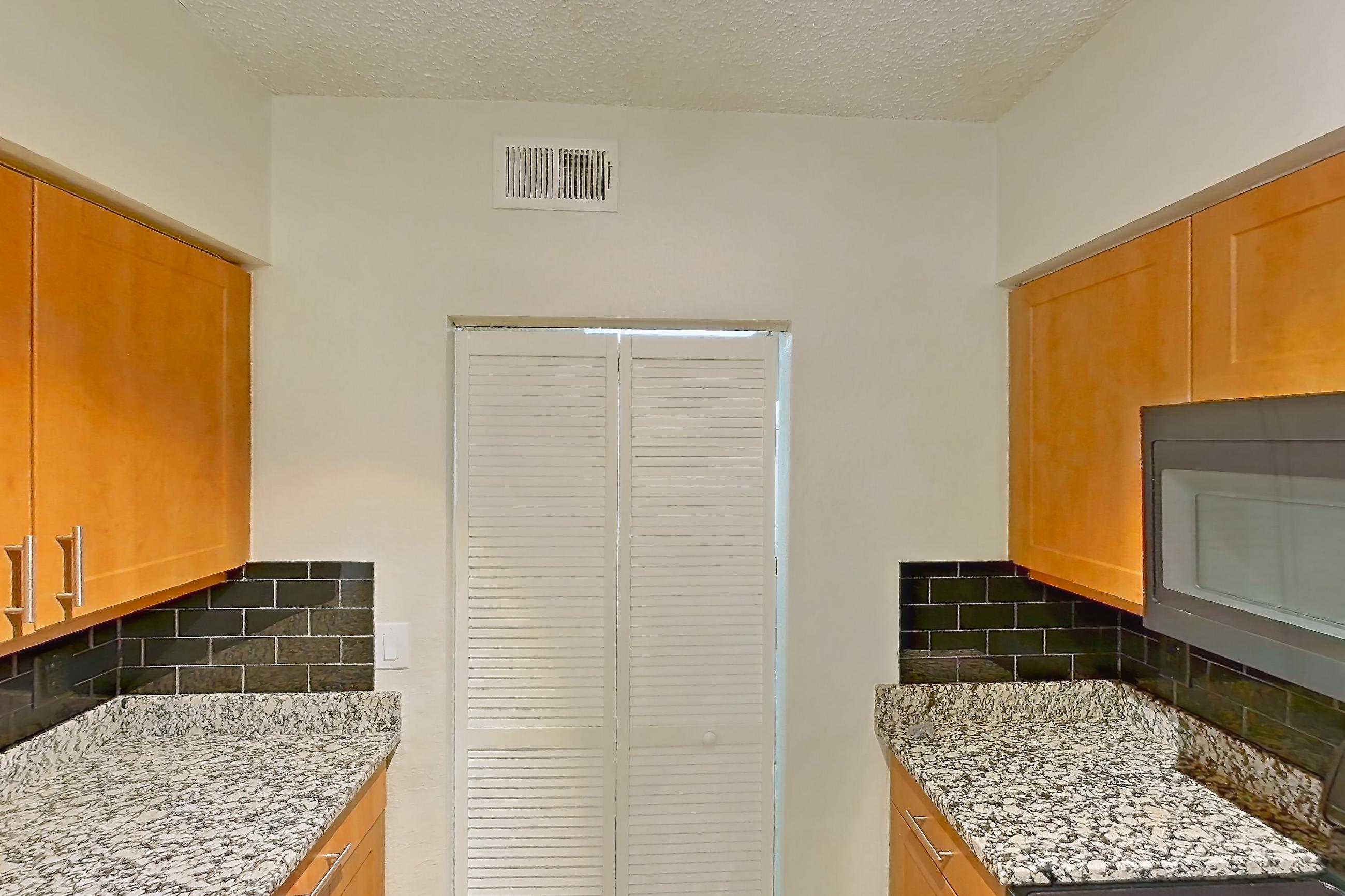 Kitchen in Apartment 565238 at Cortland Bayport, A4 - Coastal South 1 floor plan