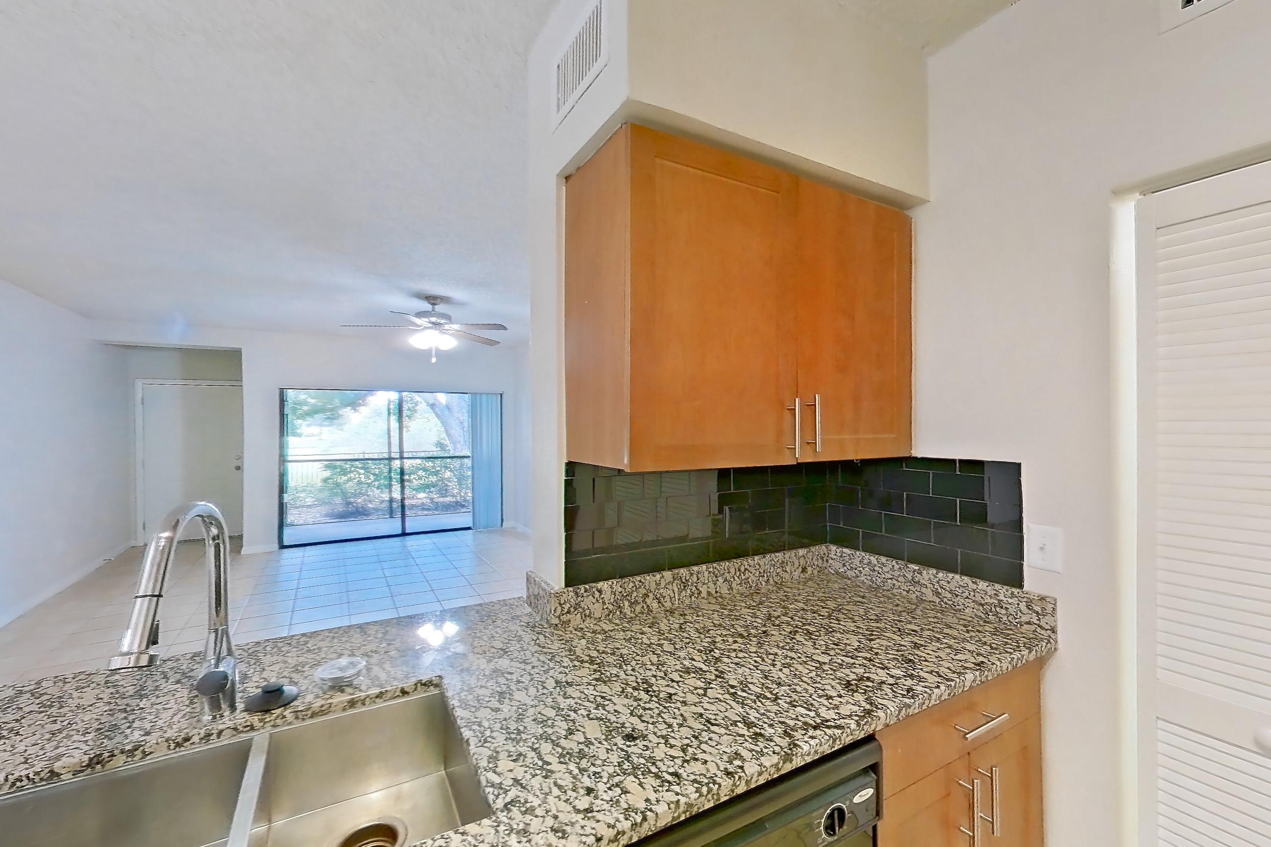 Kitchen in Apartment 525318 at Cortland Bayport, B11 - Lagoon South 1 floor plan