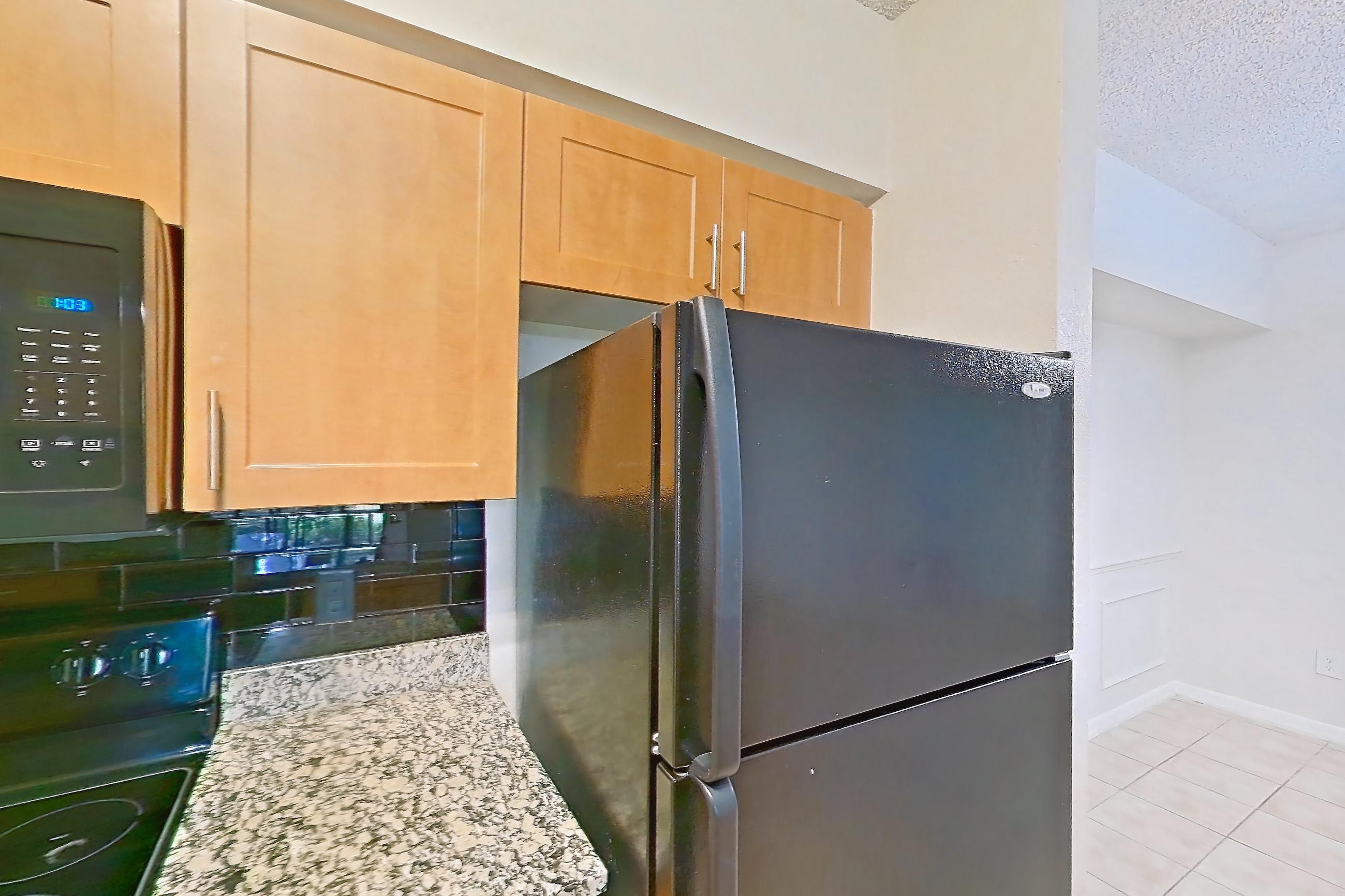 Kitchen in Apartment 525318 at Cortland Bayport, B11 - Lagoon South 1 floor plan