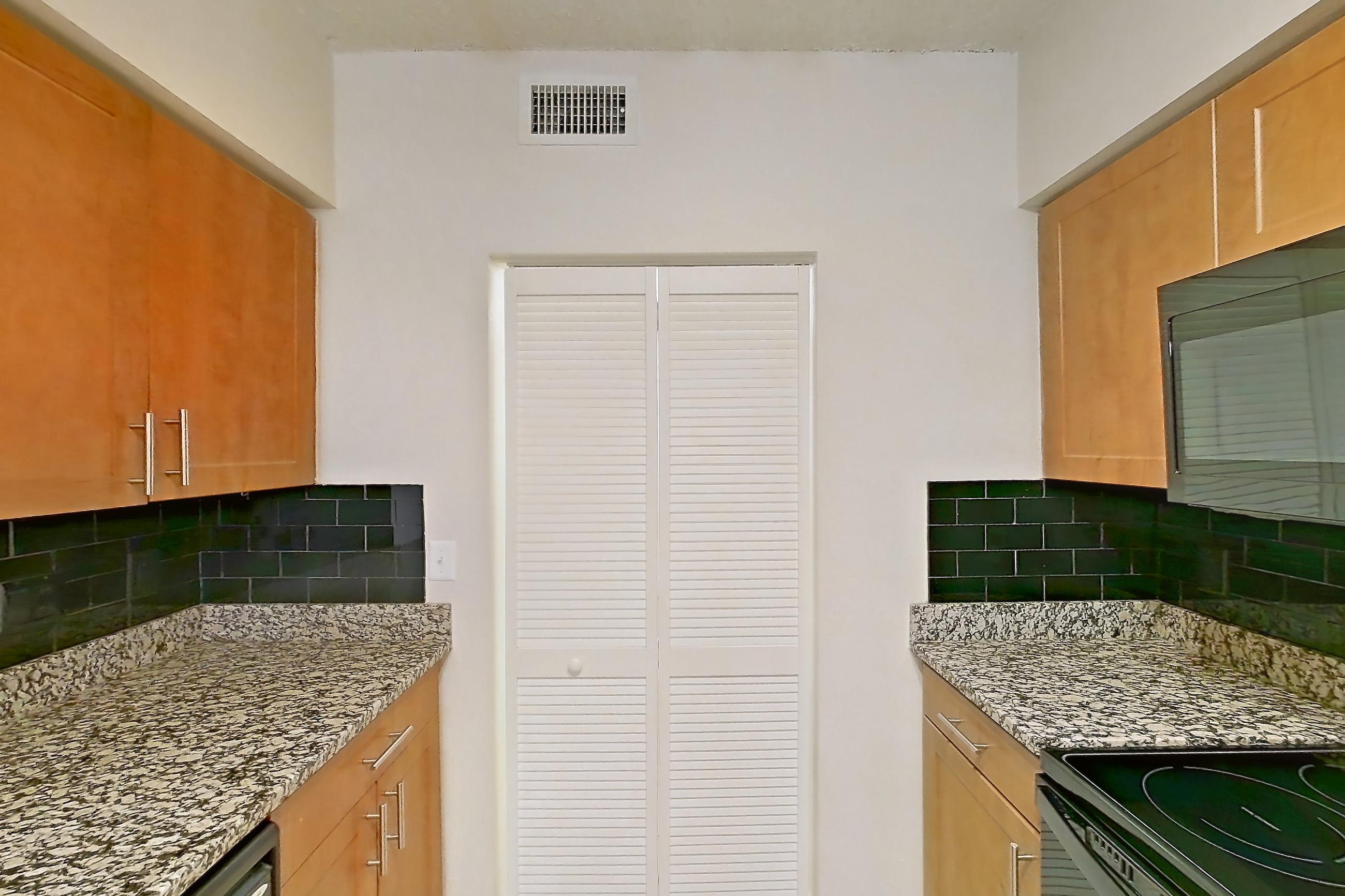 Kitchen in Apartment 525318 at Cortland Bayport, B11 - Lagoon South 1 floor plan