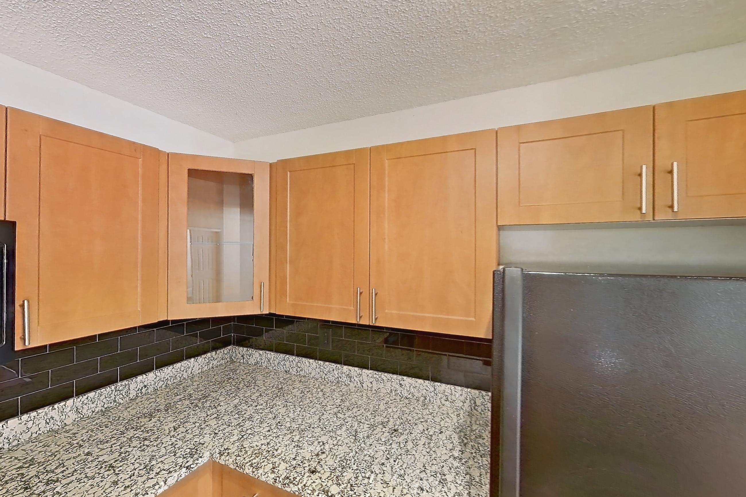 Kitchen in Apartment 065574 at Cortland Bayport, B4 - Gulf South 1 floor plan