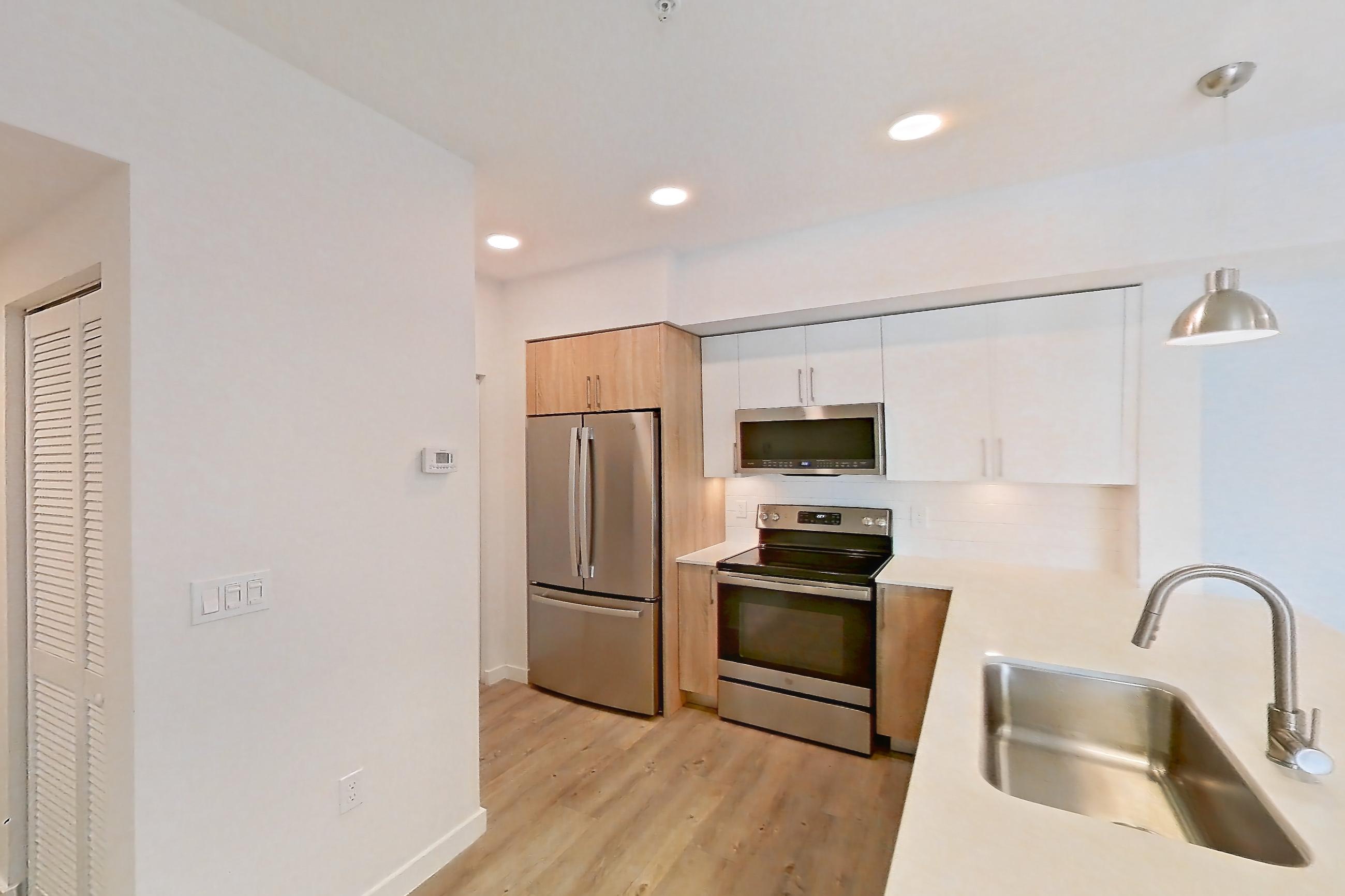 Kitchen entryway in Apartment 19-304 at Cortland South Kendall, B3 - Key floor plan