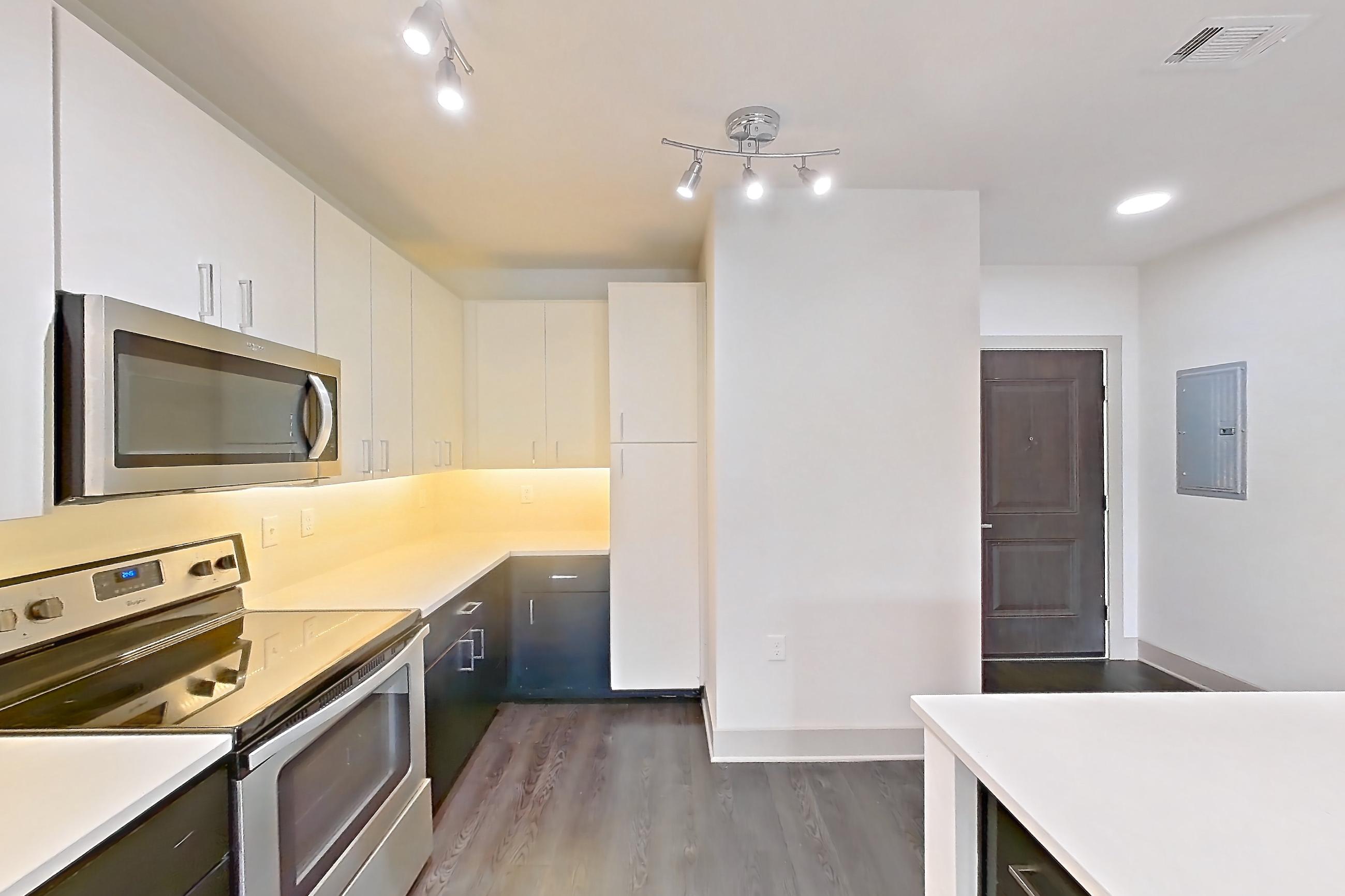 Kitchen in Apartment 4-203 at Cortland Bayport, B7 - Marine North floor plan