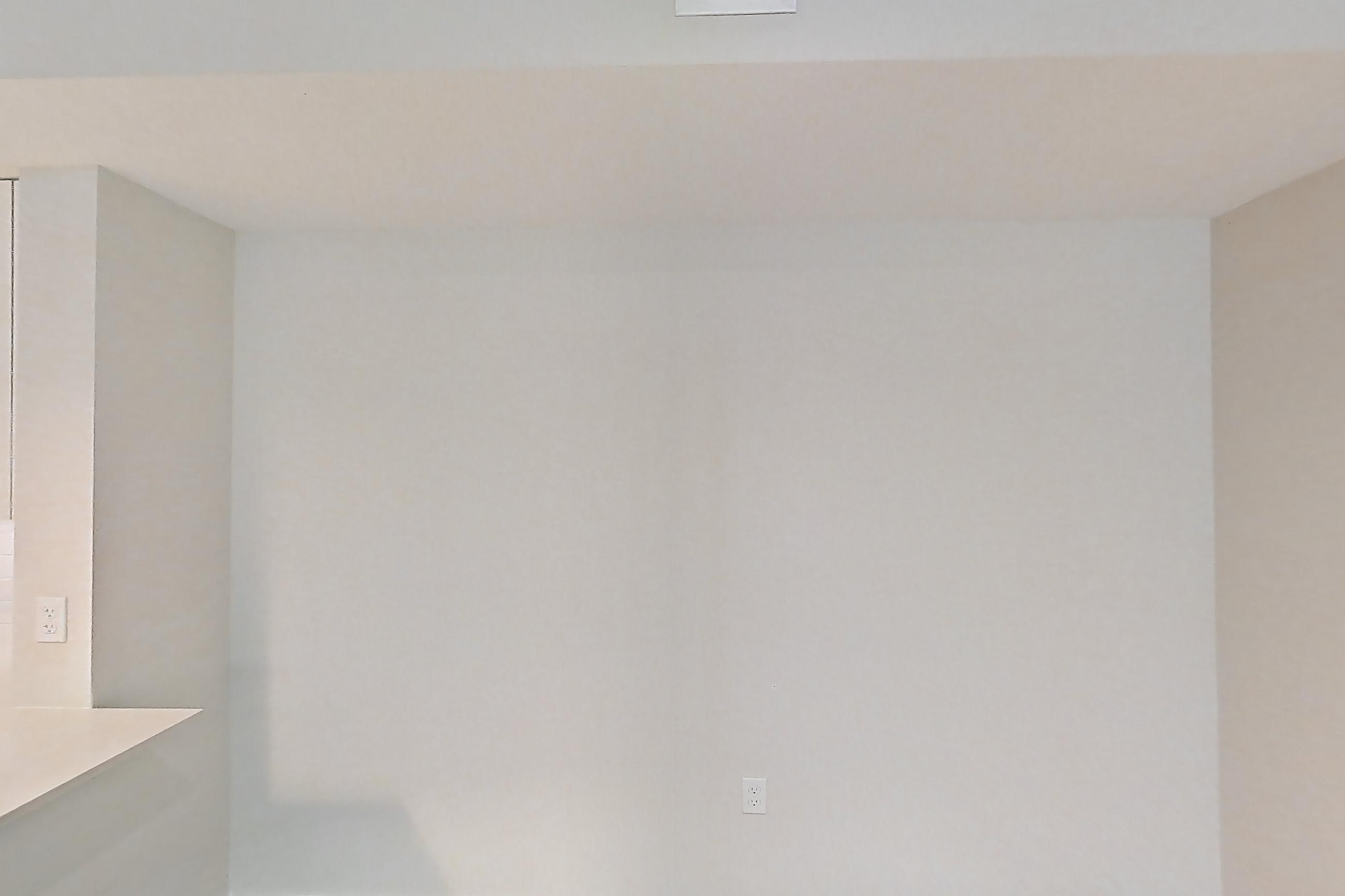 Living space with electric range, light countertops, light stone countertops, light wood-finish flooring, oven/range, refrigerator, and stainless steel appliances, Apartment 05-205 at Cortland South Kendall