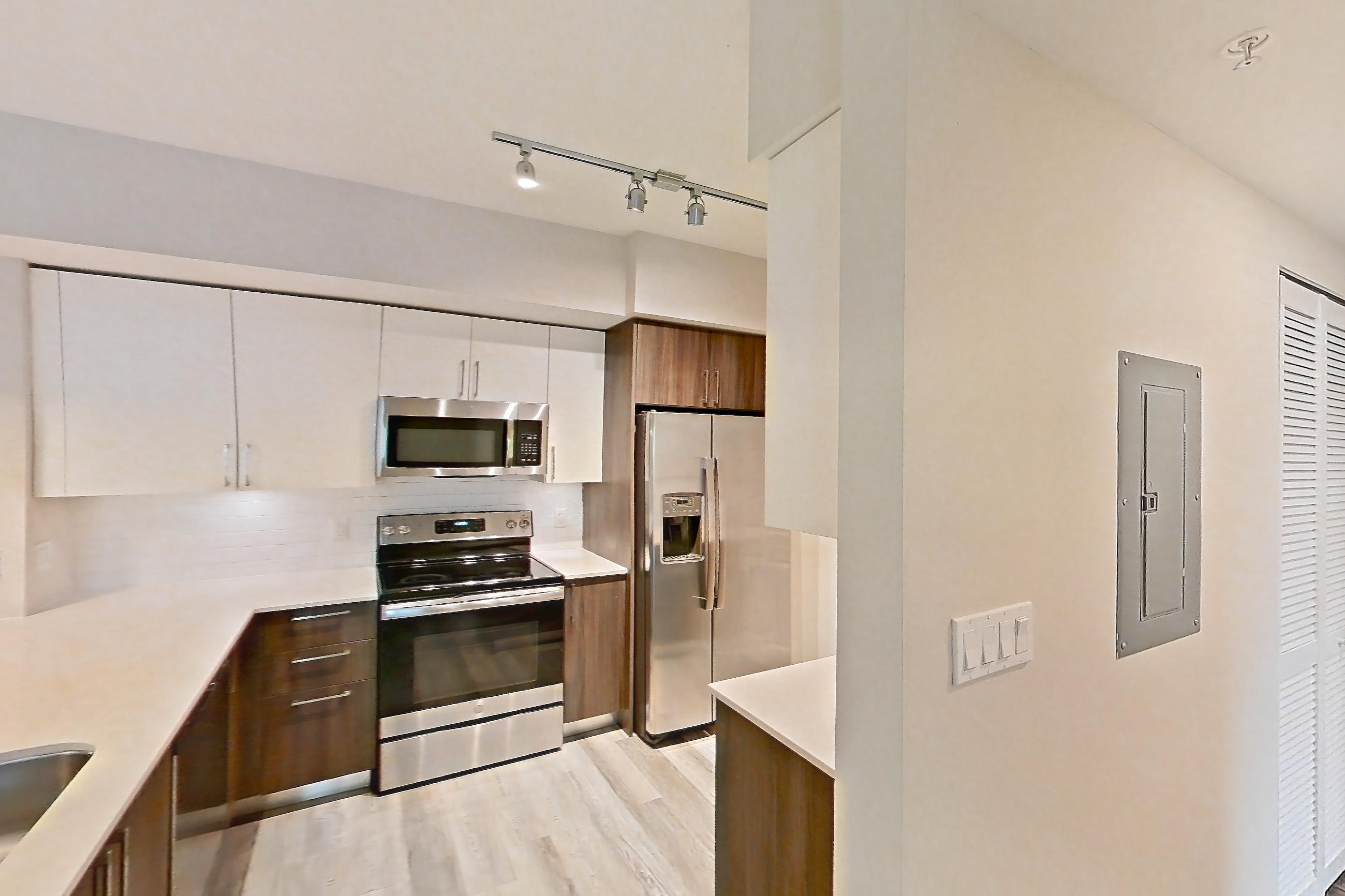 Kitchen entryway in Apartment 17-308 at Cortland South Kendall, C1 - Rock Ridge floor plan