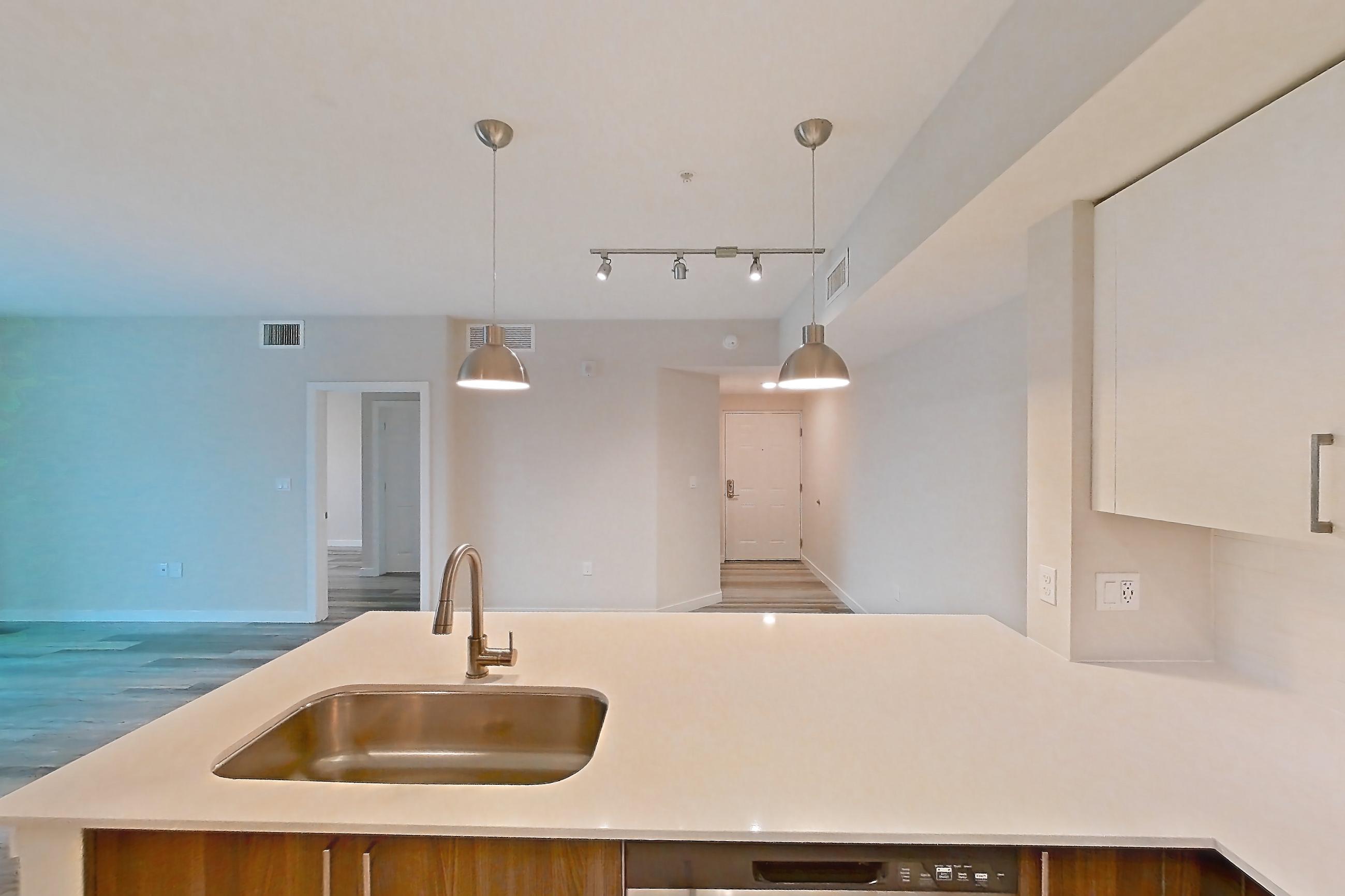 Kitchen in Apartment 17-308 at Cortland South Kendall, C1 - Rock Ridge floor plan