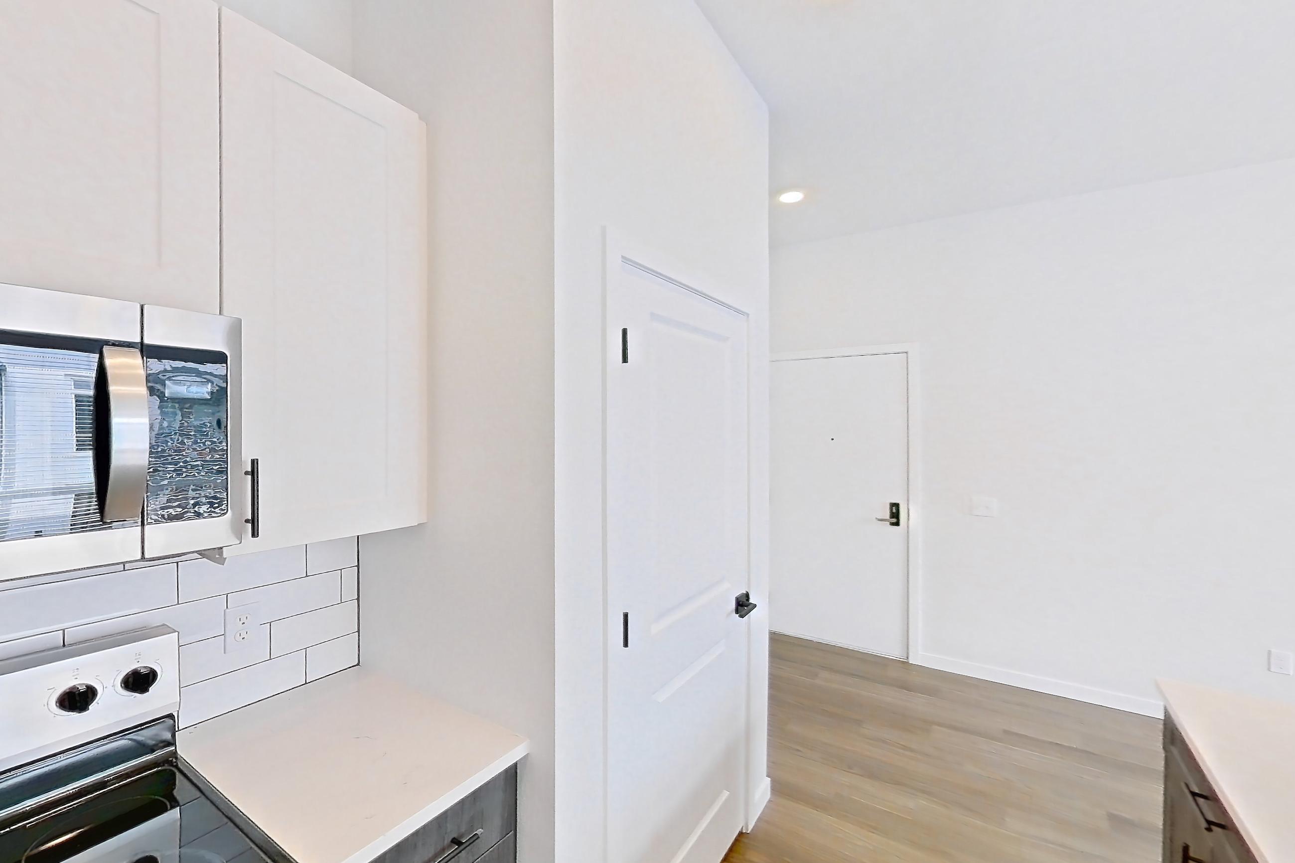 Kitchen in Apartment 09-309 at Marlon at Central Park, 1D floor plan