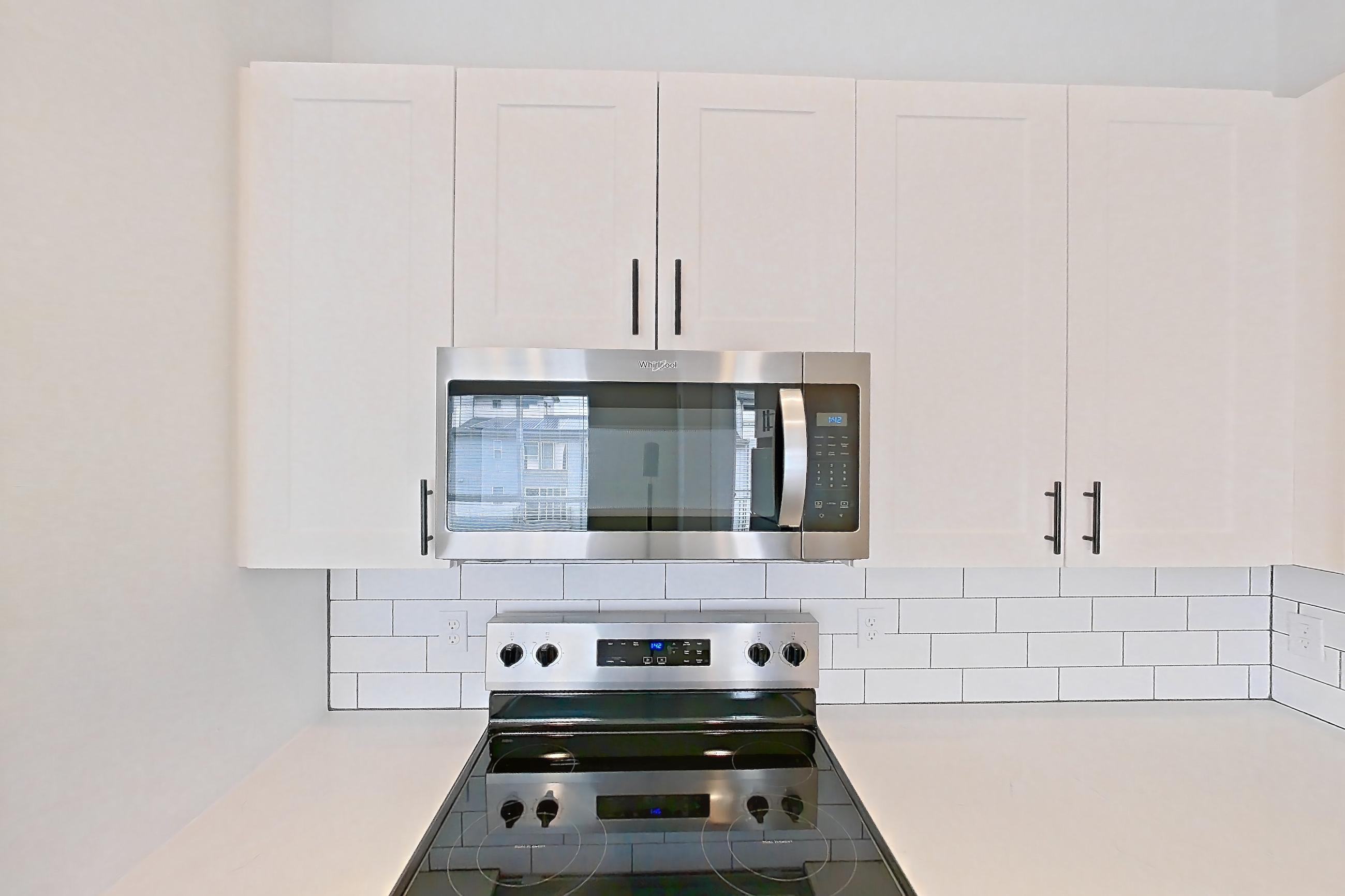 Kitchen in Apartment 09-306 at Marlon at Central Park, 1E floor plan