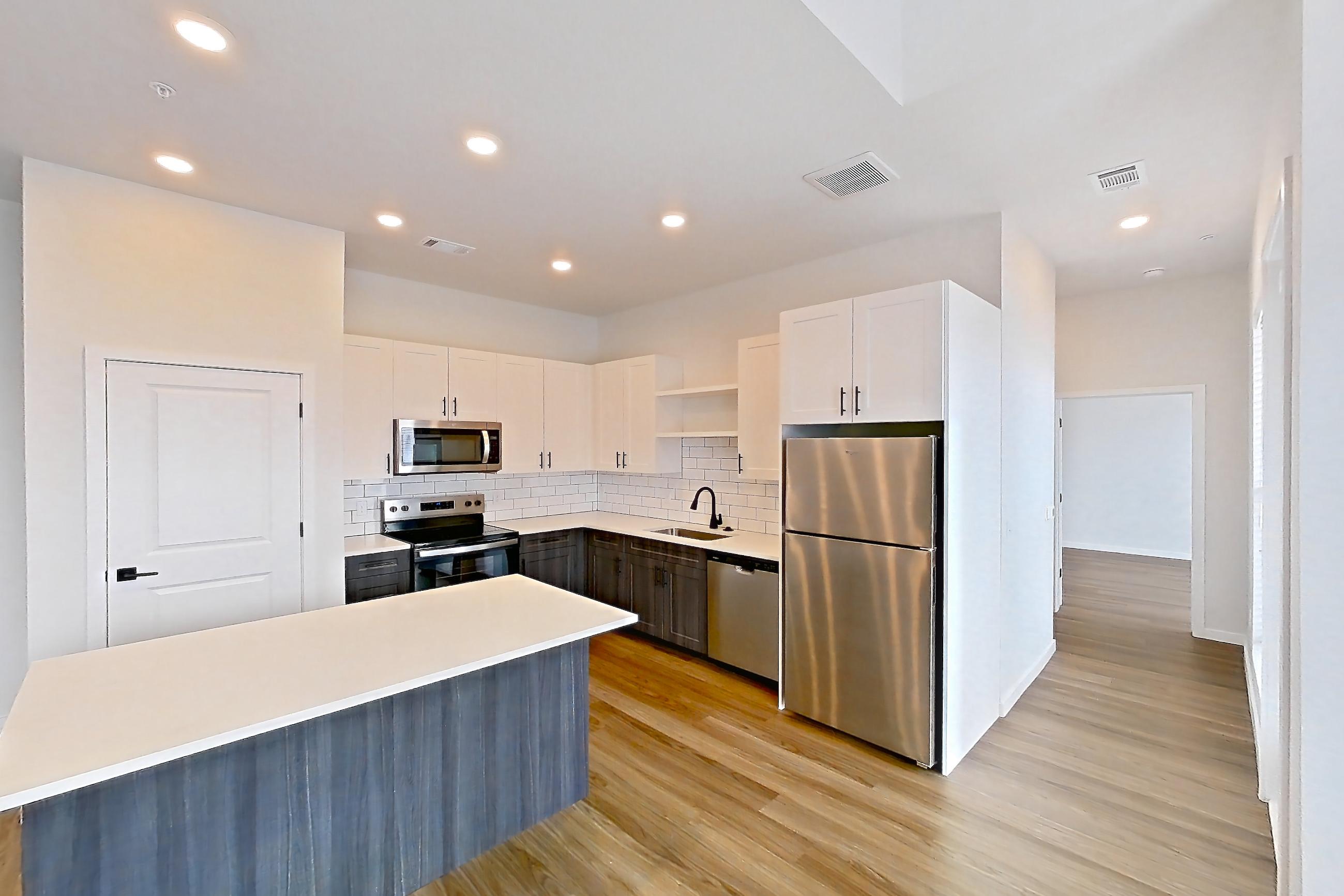 Living space in Apartment 09-306 at Marlon at Central Park, 1E floor plan
