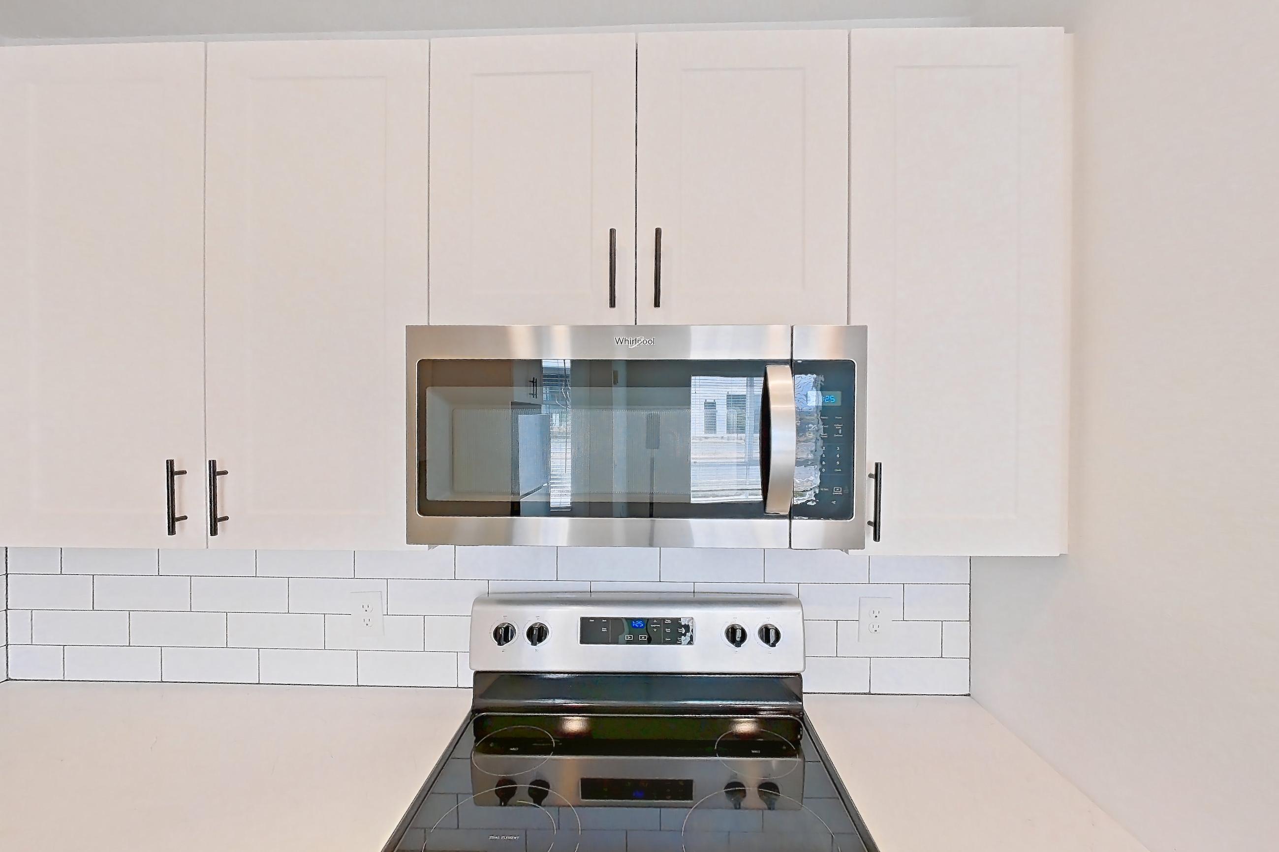 Kitchen in Apartment 06-103 at Marlon at Central Park, 1F floor plan