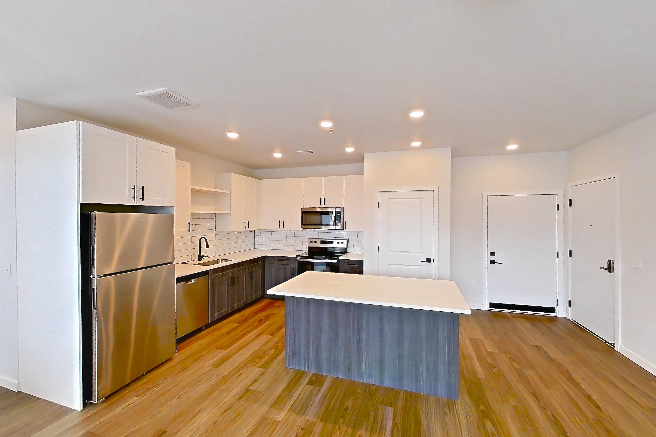 Living space in Apartment 06-103 at Marlon at Central Park, 1F floor plan