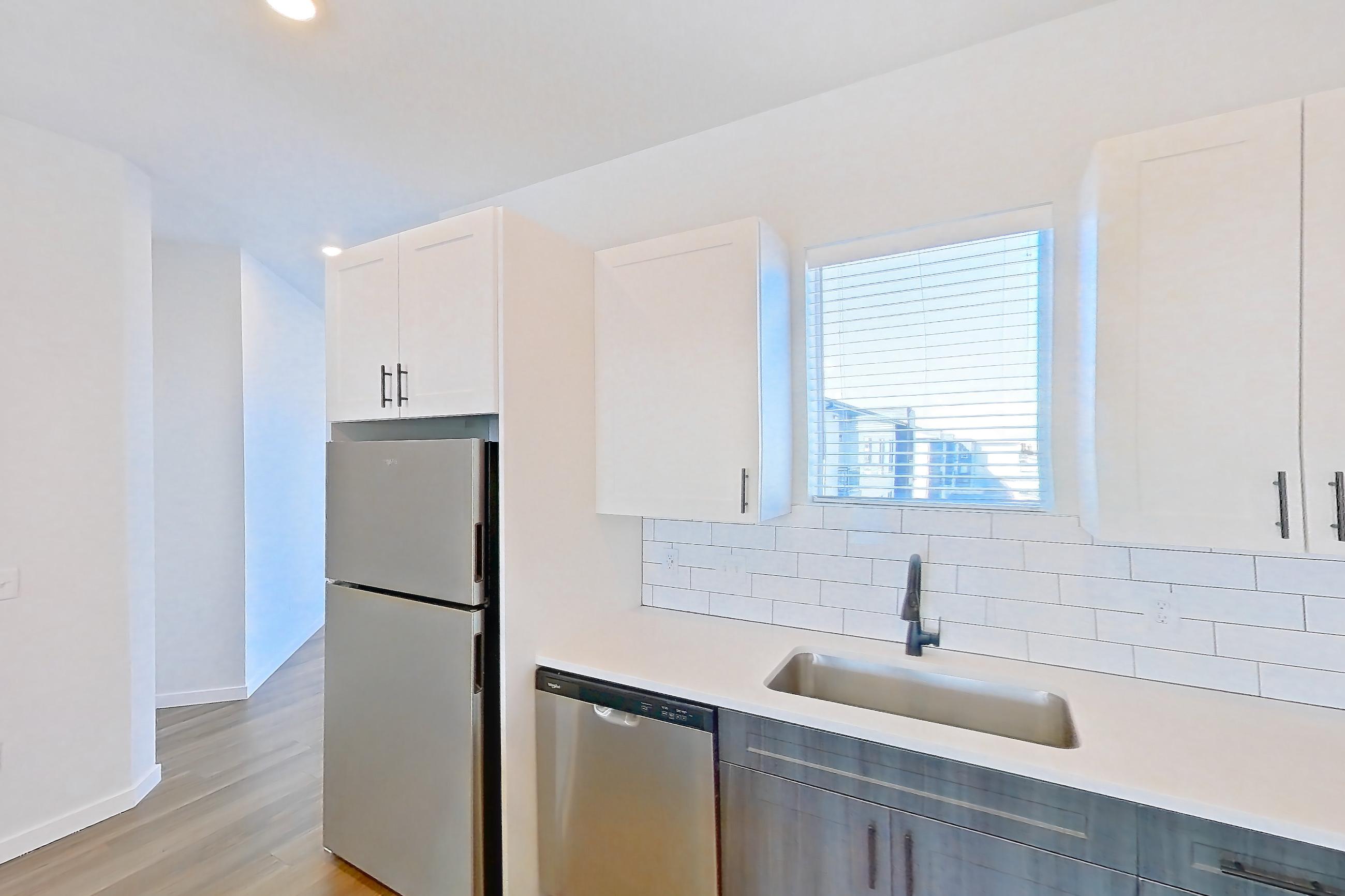 Kitchen in Apartment 10-301 at Marlon at Central Park, 2F floor plan