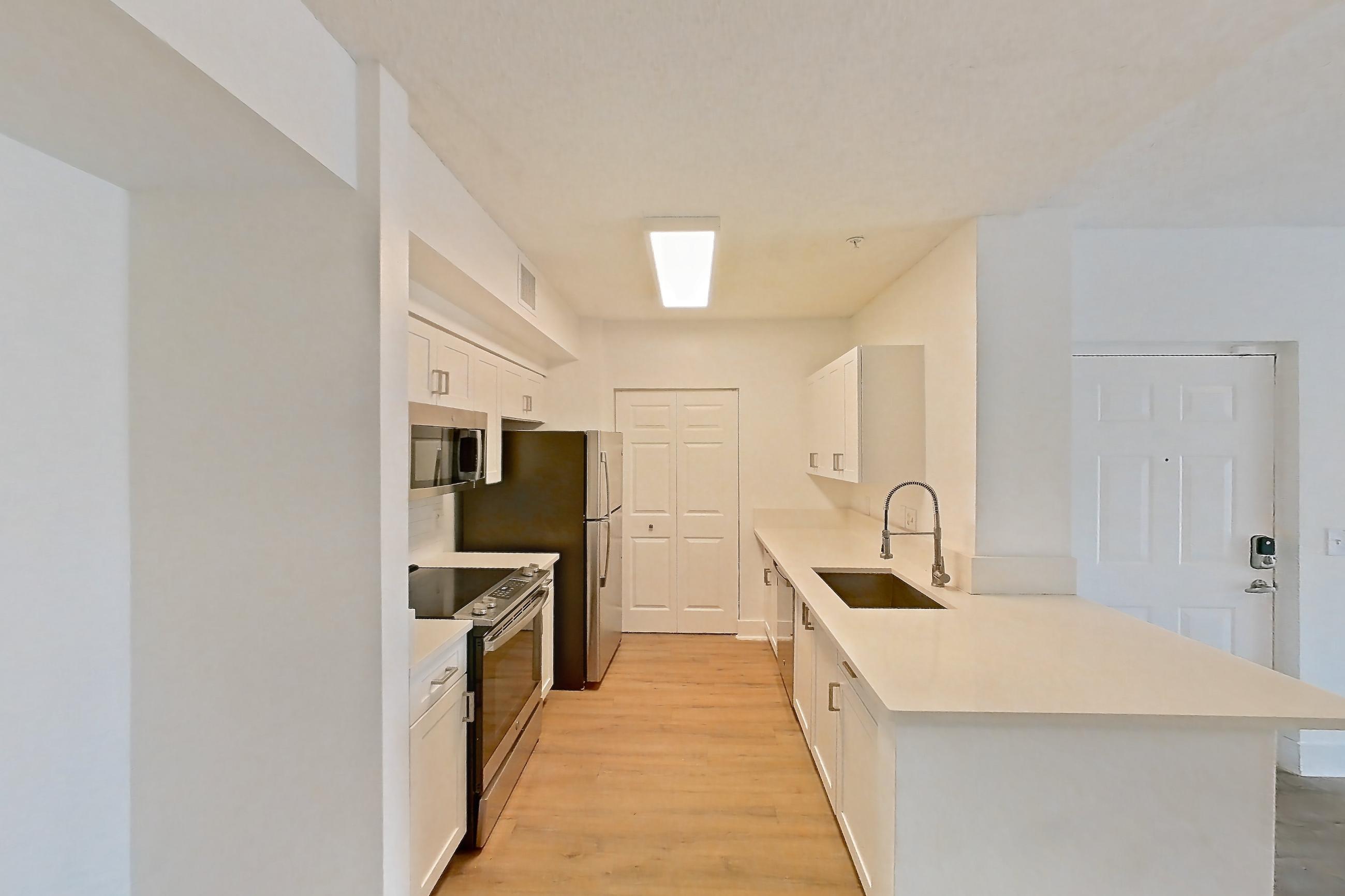 Living space, Apartment 03-207 at Miramar Lakes
