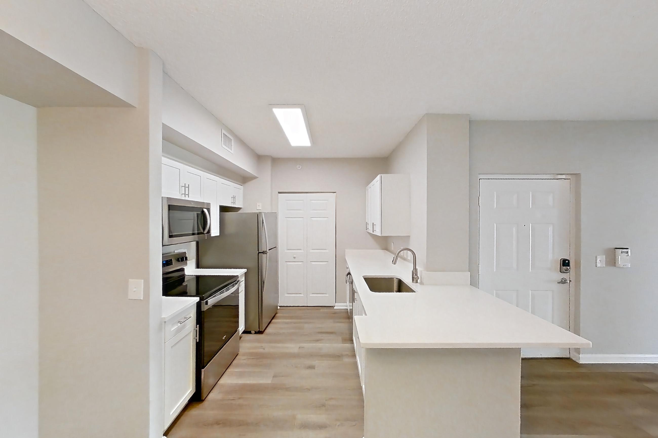 Living space, Apartment 17-107 at Miramar Lakes