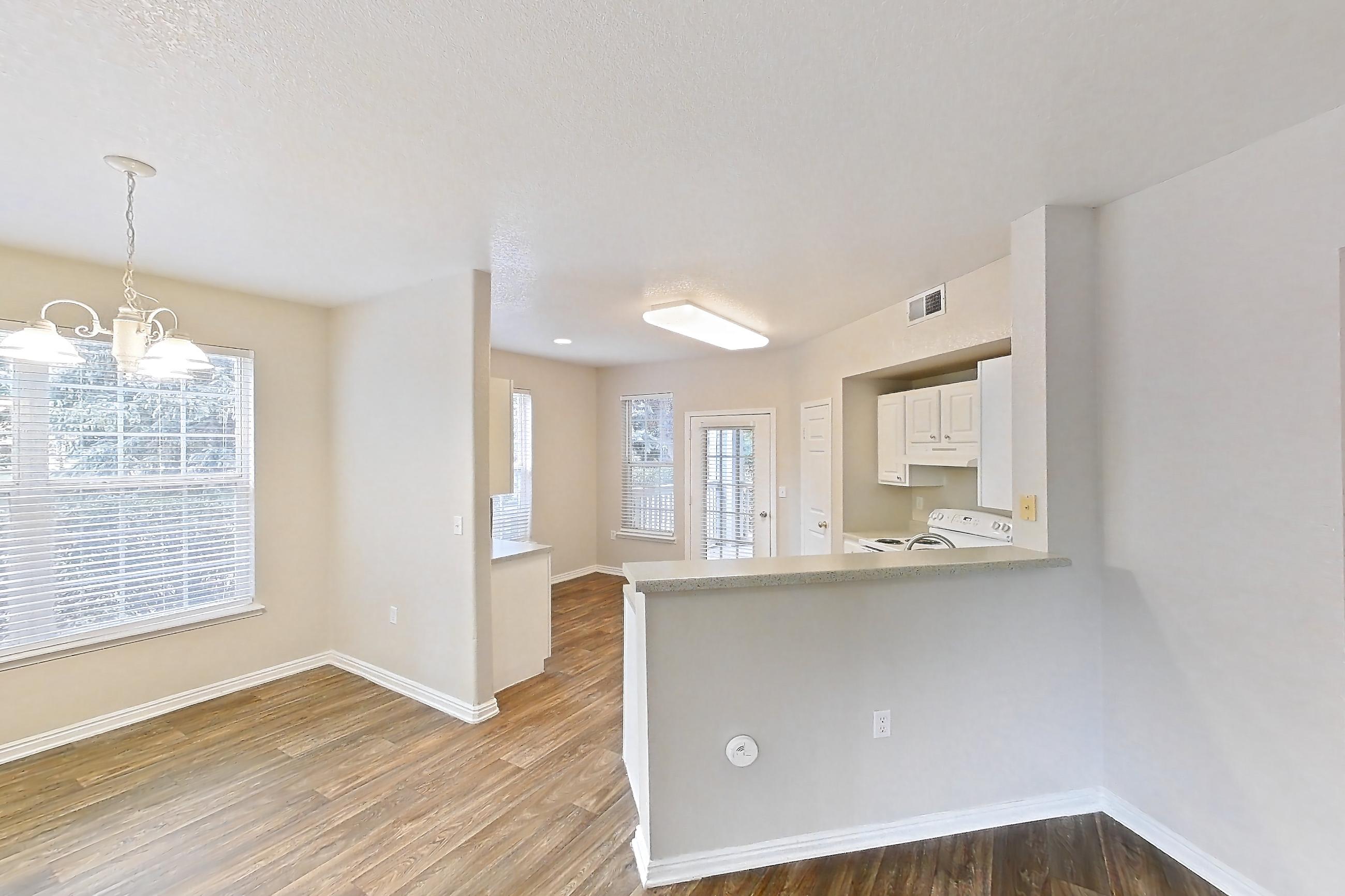 Living space in a 2C floor plan apartment, representative of Apartment 06-103 at Eagle Ridge
