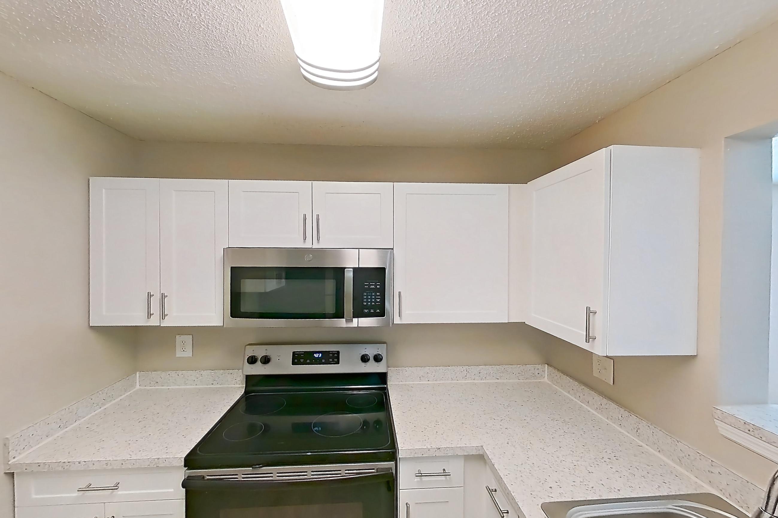 Kitchen in Apartment 1402 at The Dawson, 1C floor plan