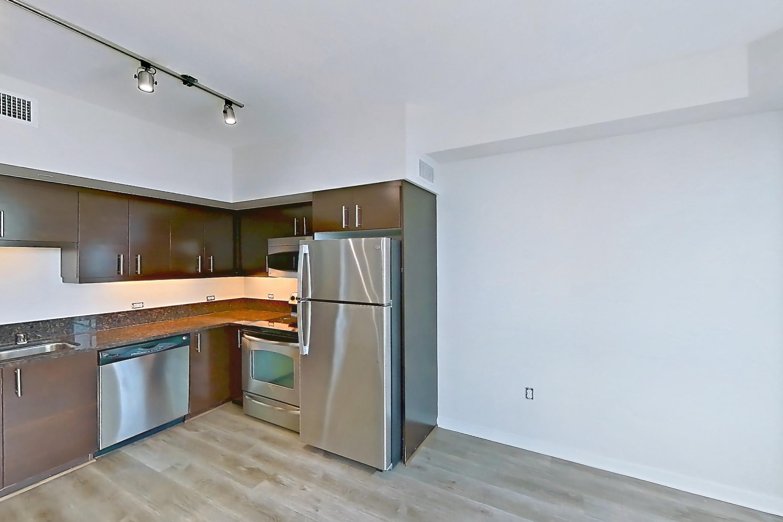 Living room in Apartment c-1409 at Vantage Pointe, 1G floor plan
