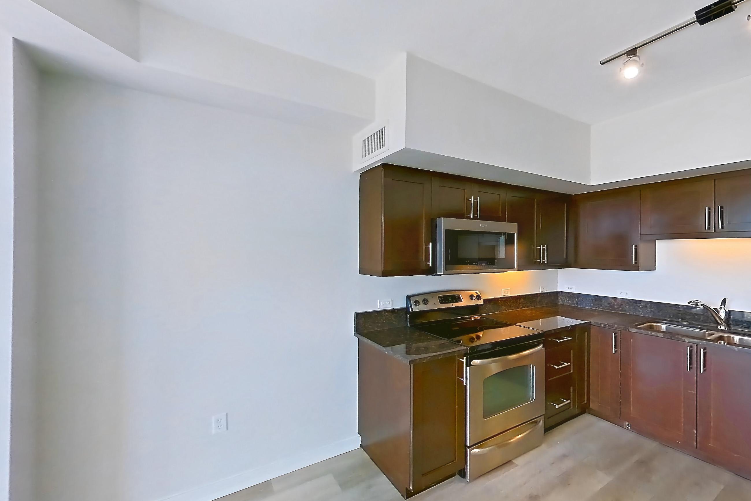 Living room in Apartment c-1611 at Vantage Pointe, 2F floor plan