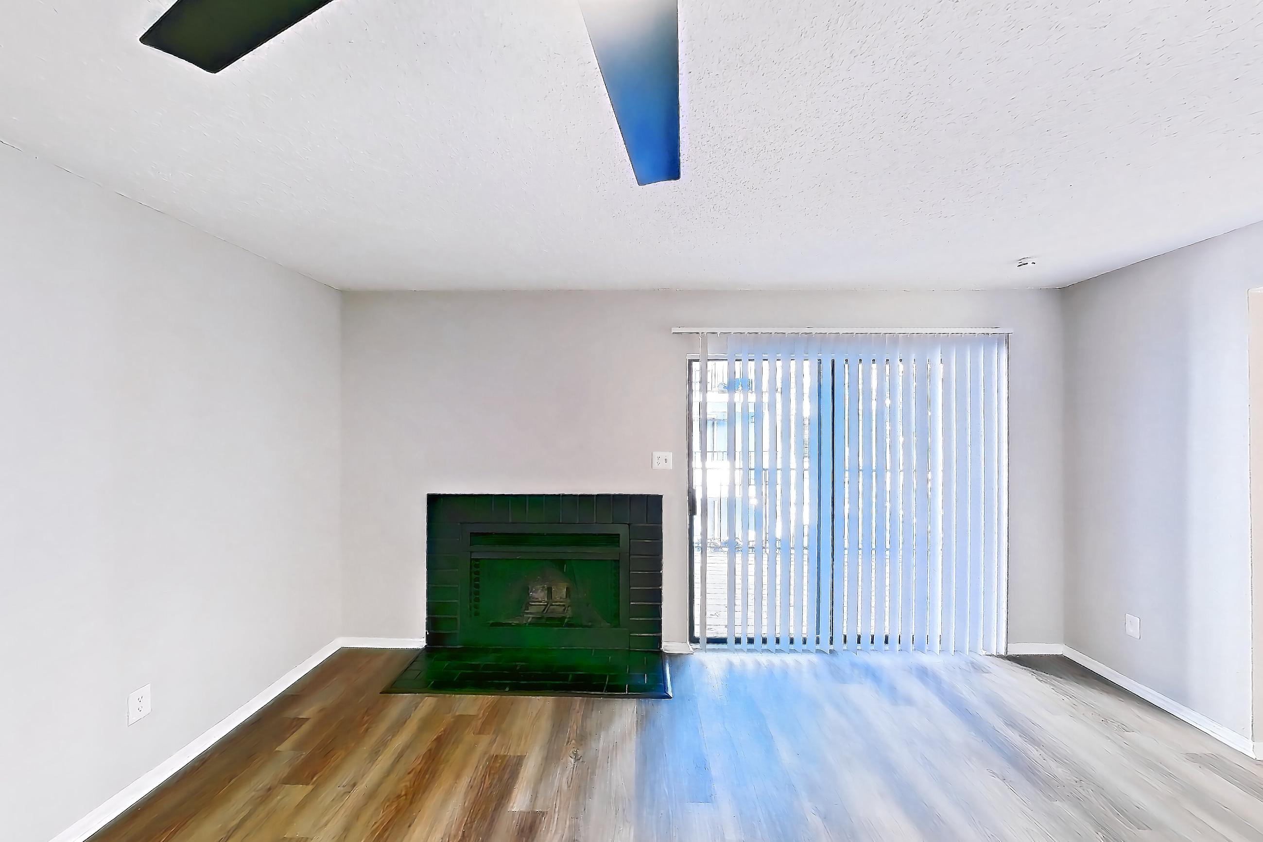 Living room with fireplace, Apartment 0505 at Beacon Hill