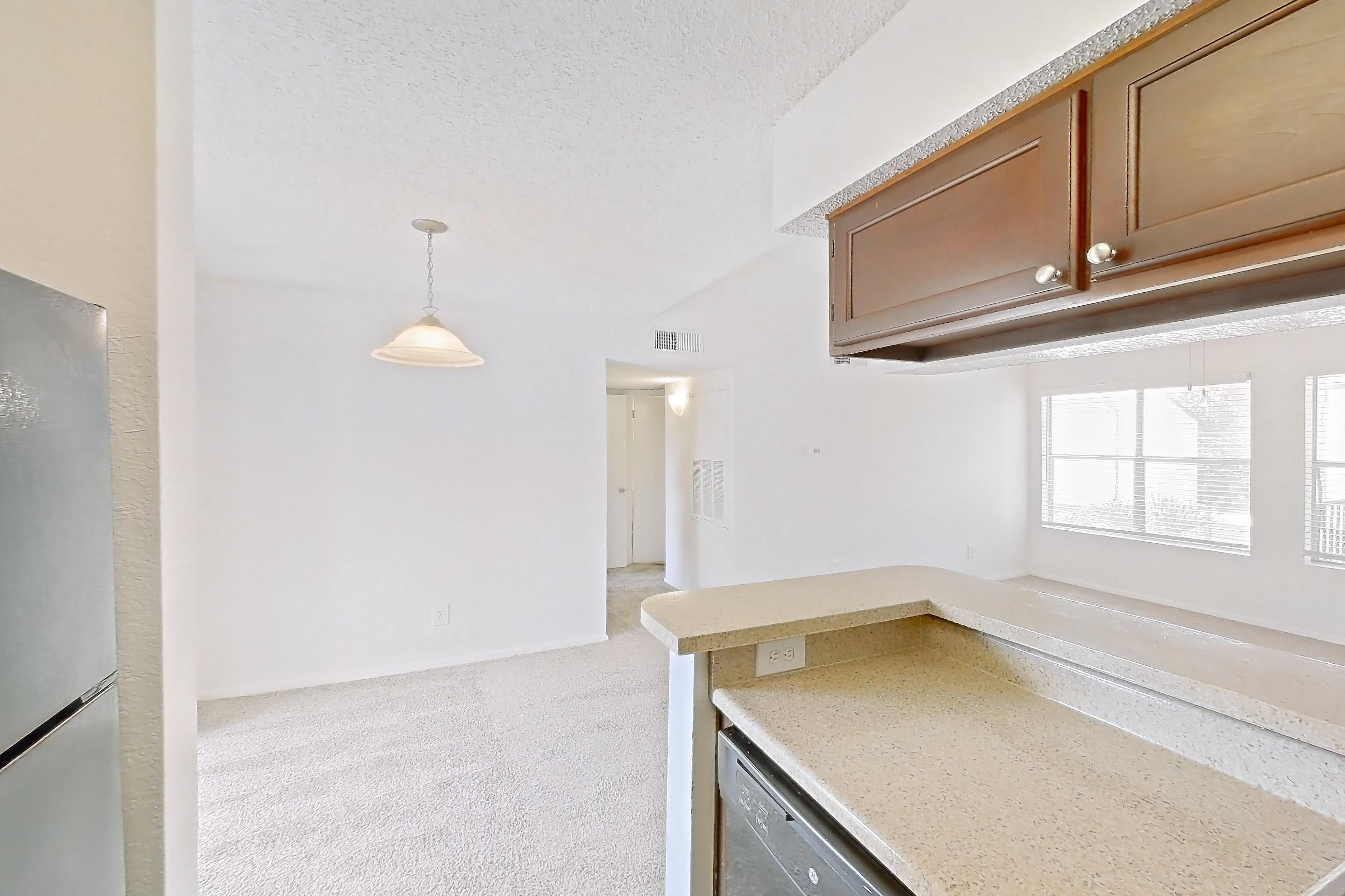 Kitchen in a 1A floor plan apartment, representative of Apartment 20-0418 at Brookwood Club
