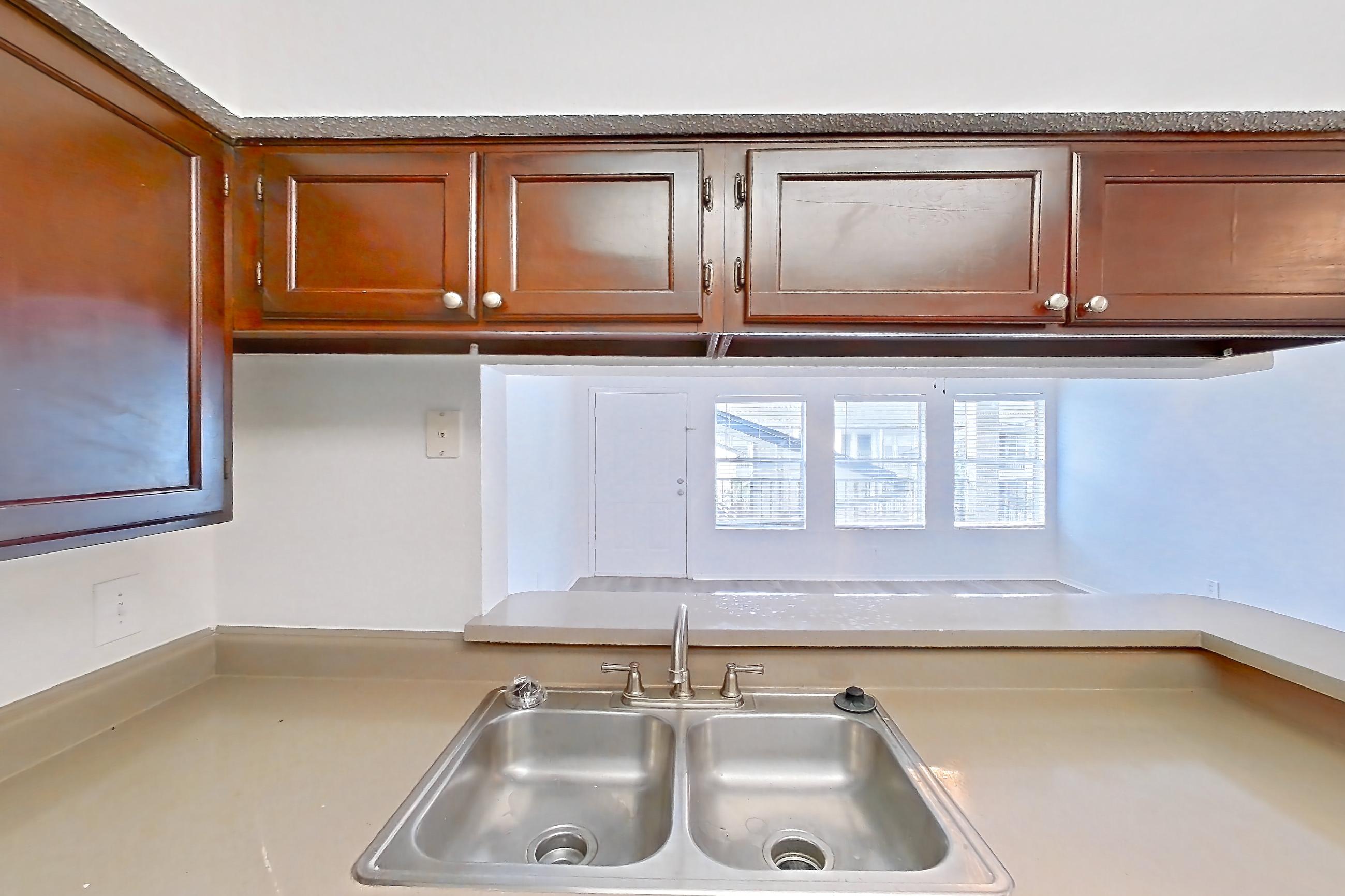 Kitchen in Apartment 10-0615 at Brookwood Club, 1B floor plan