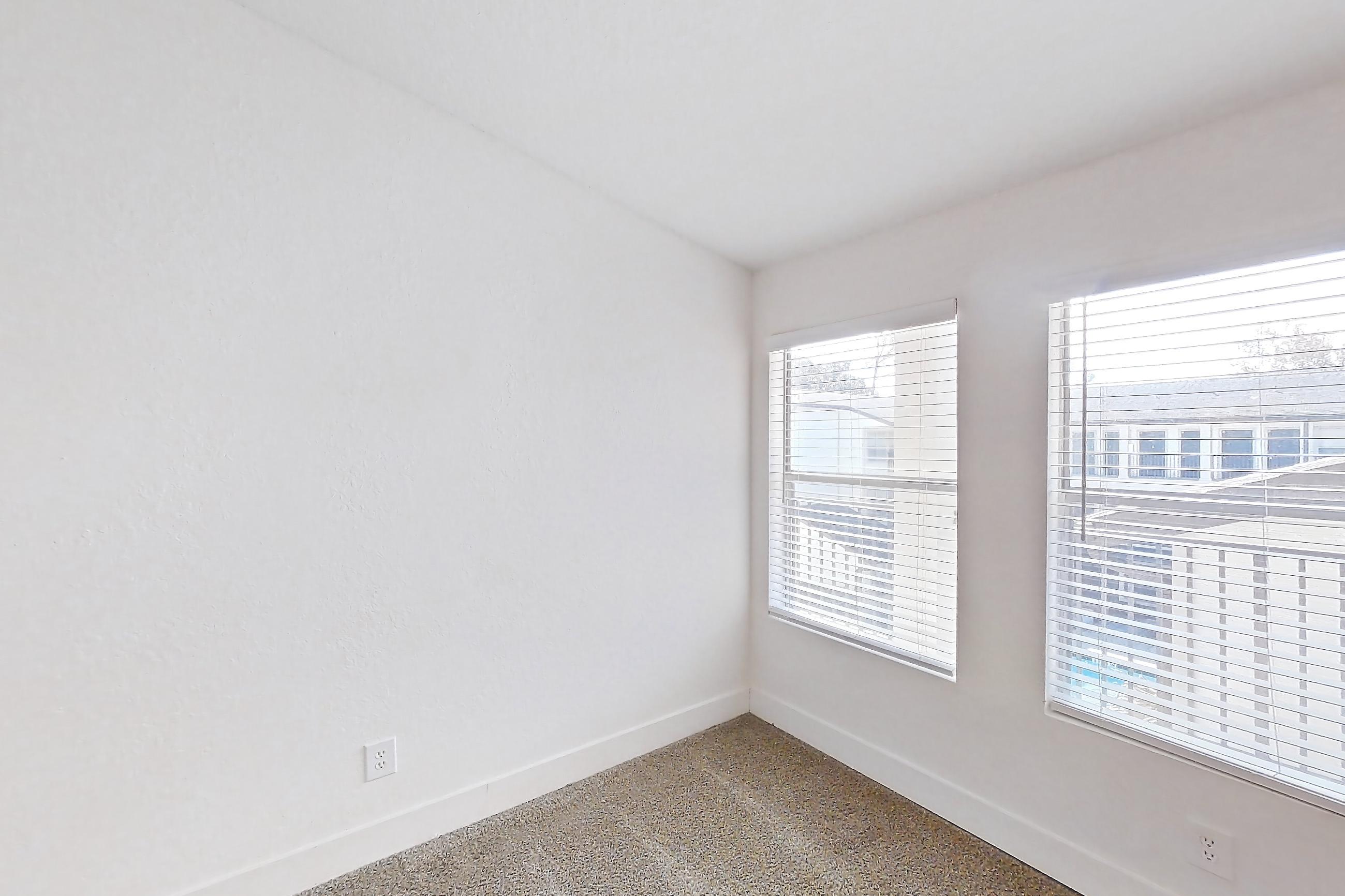 Living room in a 1B floor plan apartment, representative of Apartment 10-0916 at Brookwood Club