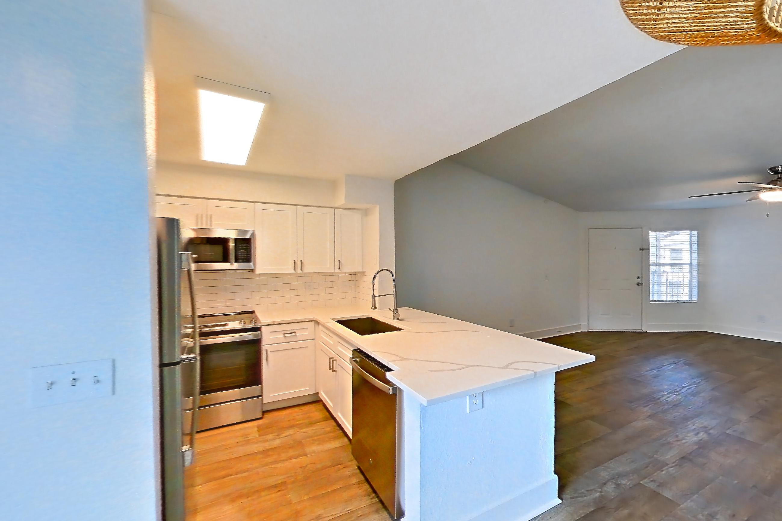 Dining room in a 2B floor plan apartment, representative of Apartment 10-0402 at Brookwood Club