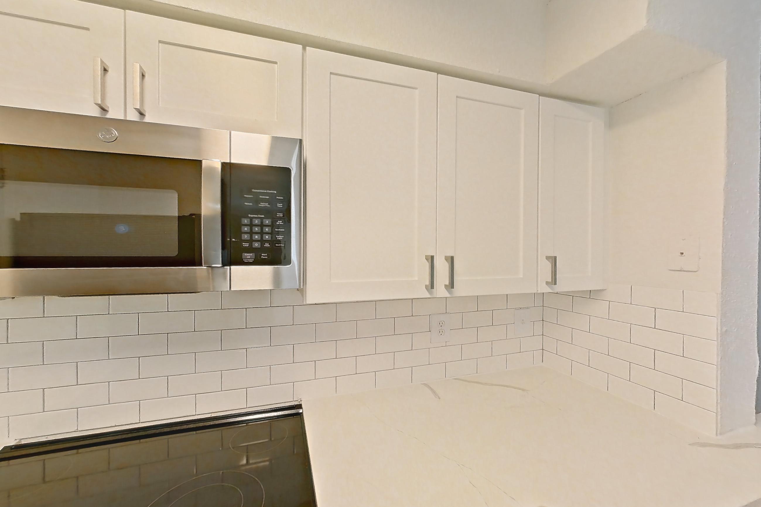 Kitchen in a 2B floor plan apartment, representative of Apartment 10-0402 at Brookwood Club