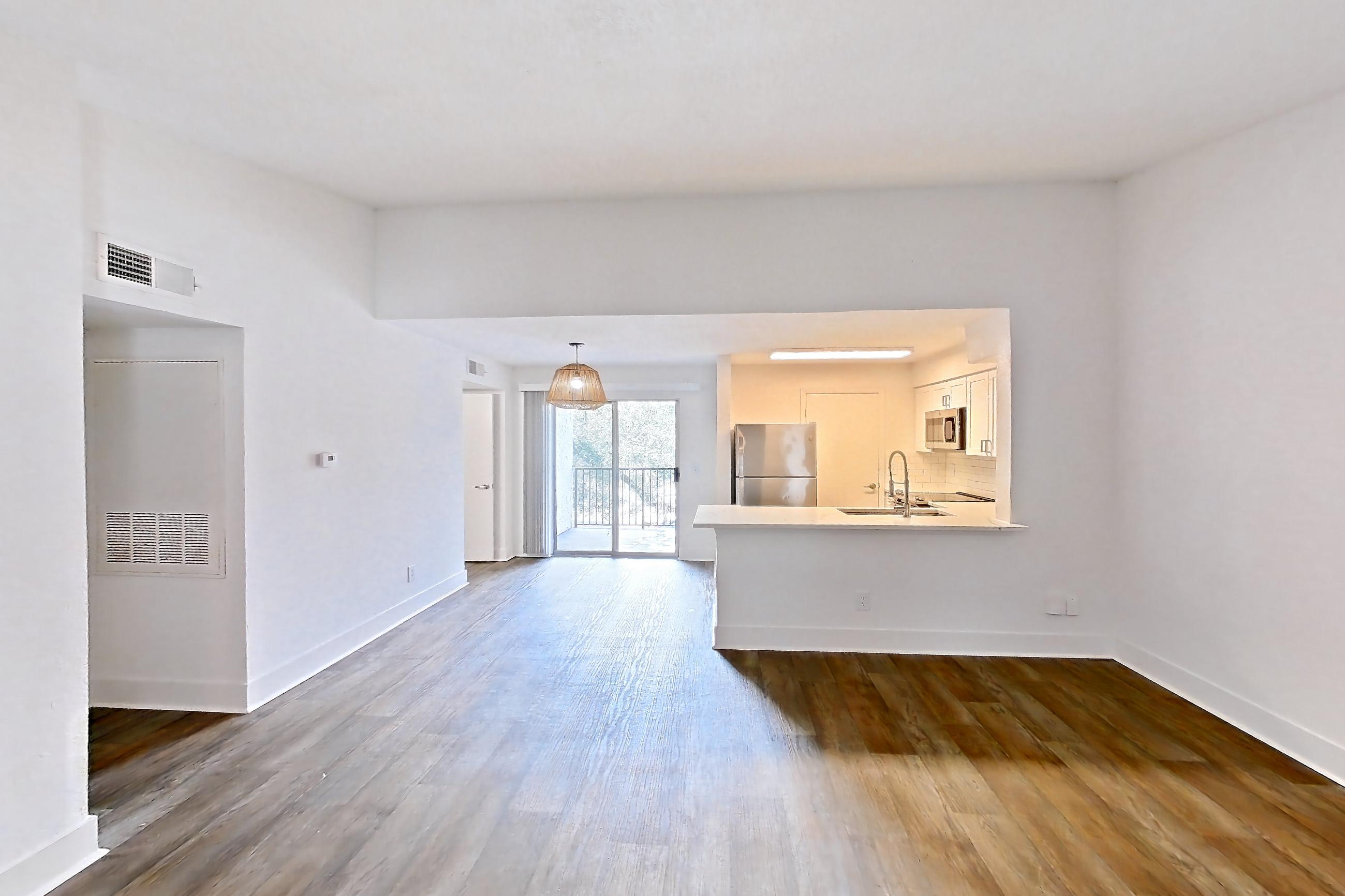 Living room in a 2B floor plan apartment, representative of Apartment 10-0402 at Brookwood Club
