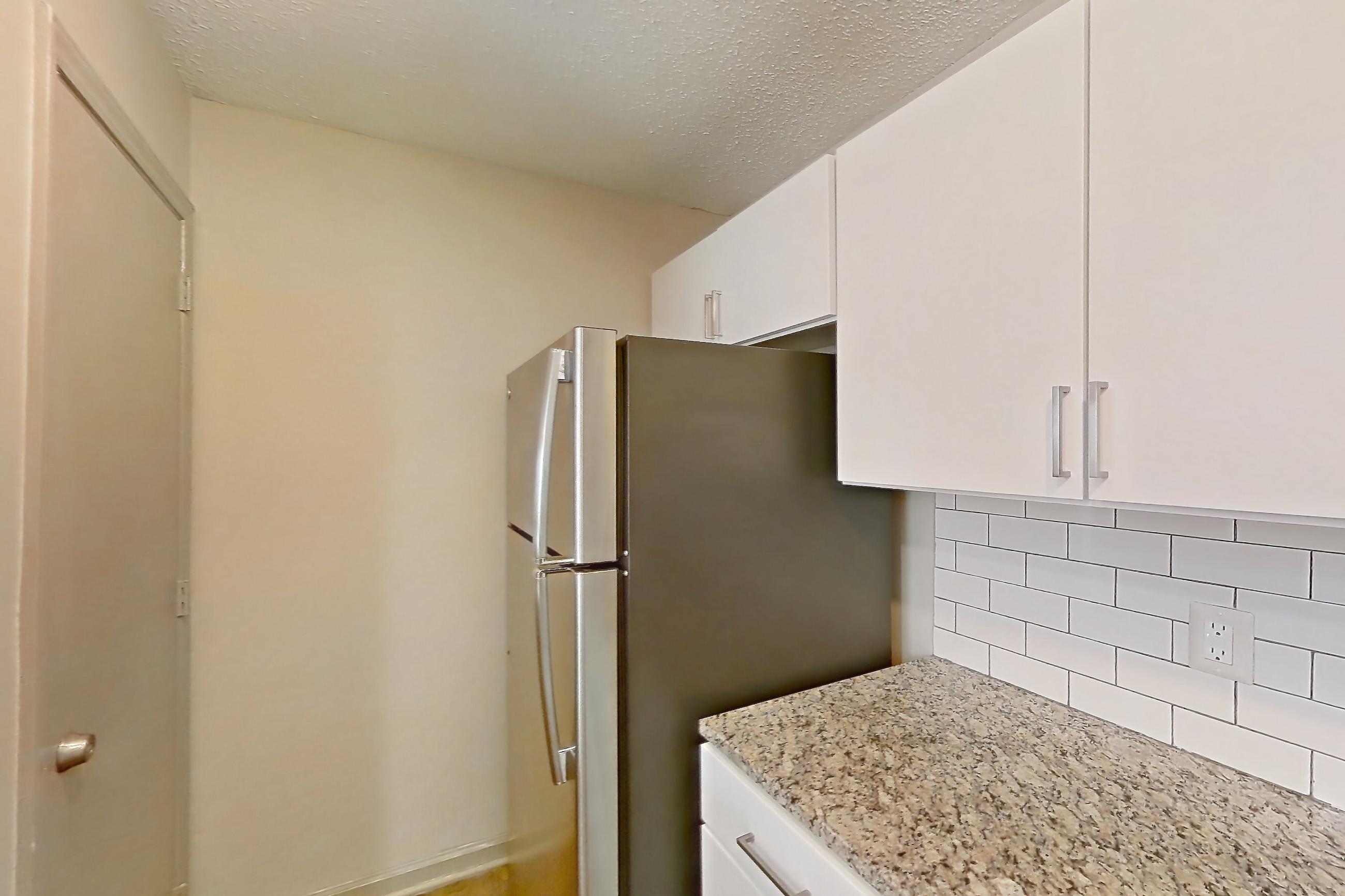 Kitchen in Apartment 61-d15 at Crosstown at Chapel Hill, 1B floor plan