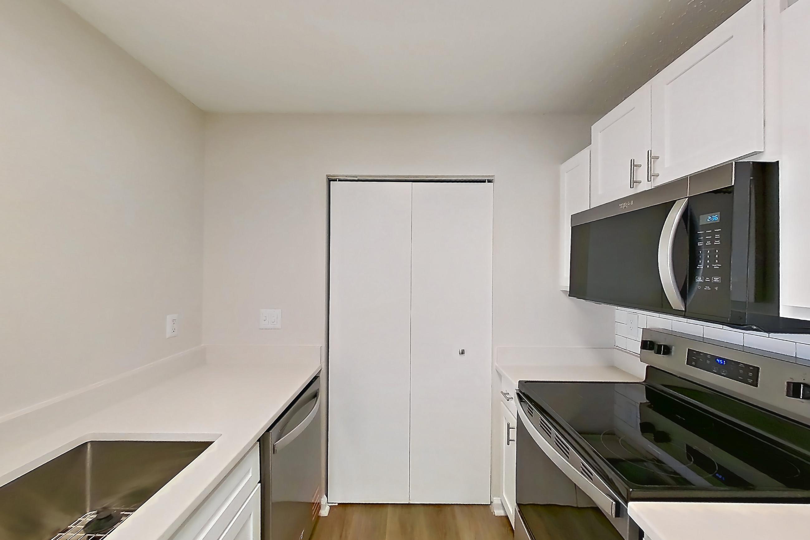 Kitchen in Apartment 61-e10 at Crosstown at Chapel Hill, 2B floor plan