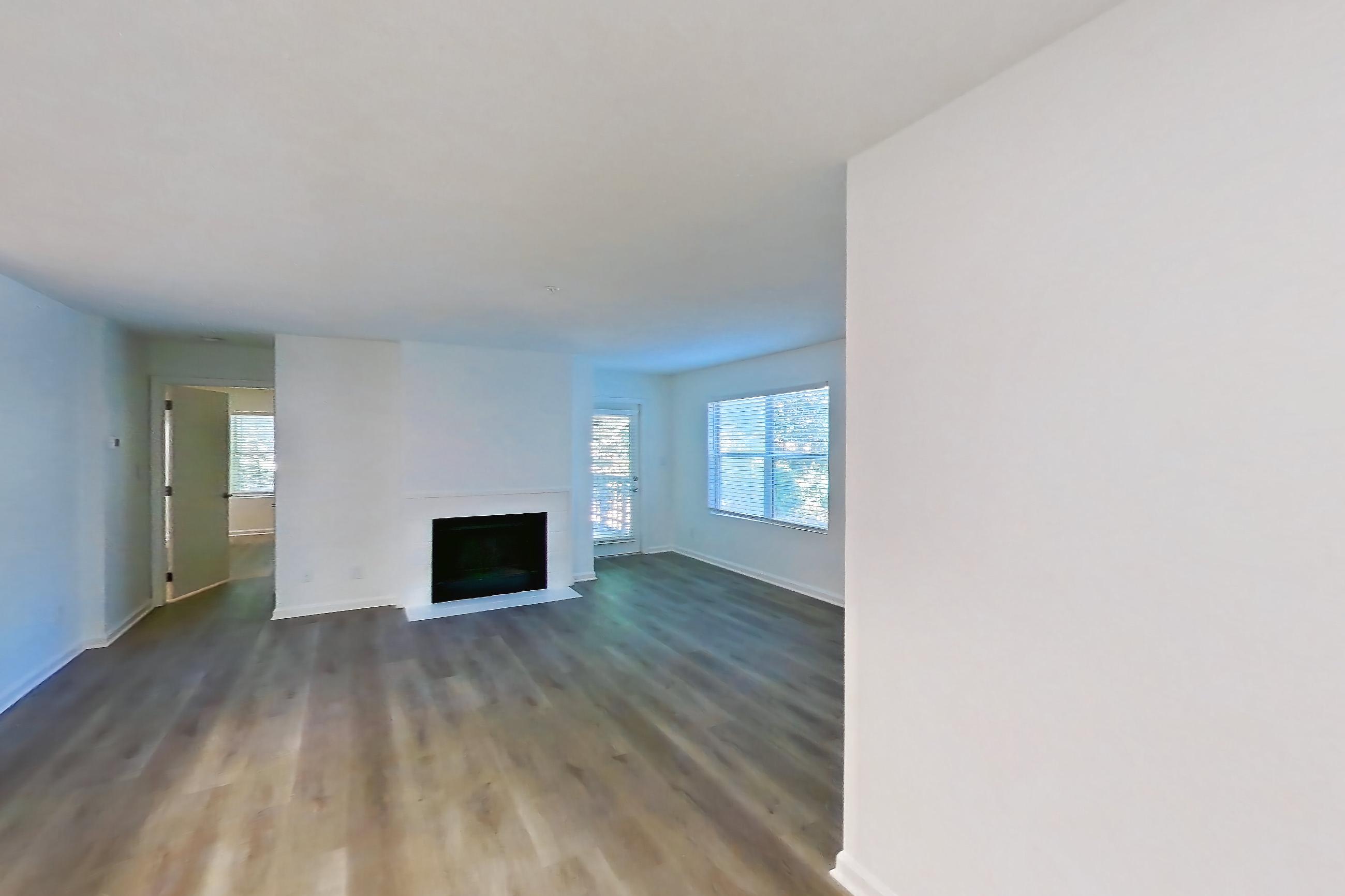 Dining room with fireplace, Apartment 61-B08 at Crosstown at Chapel Hill