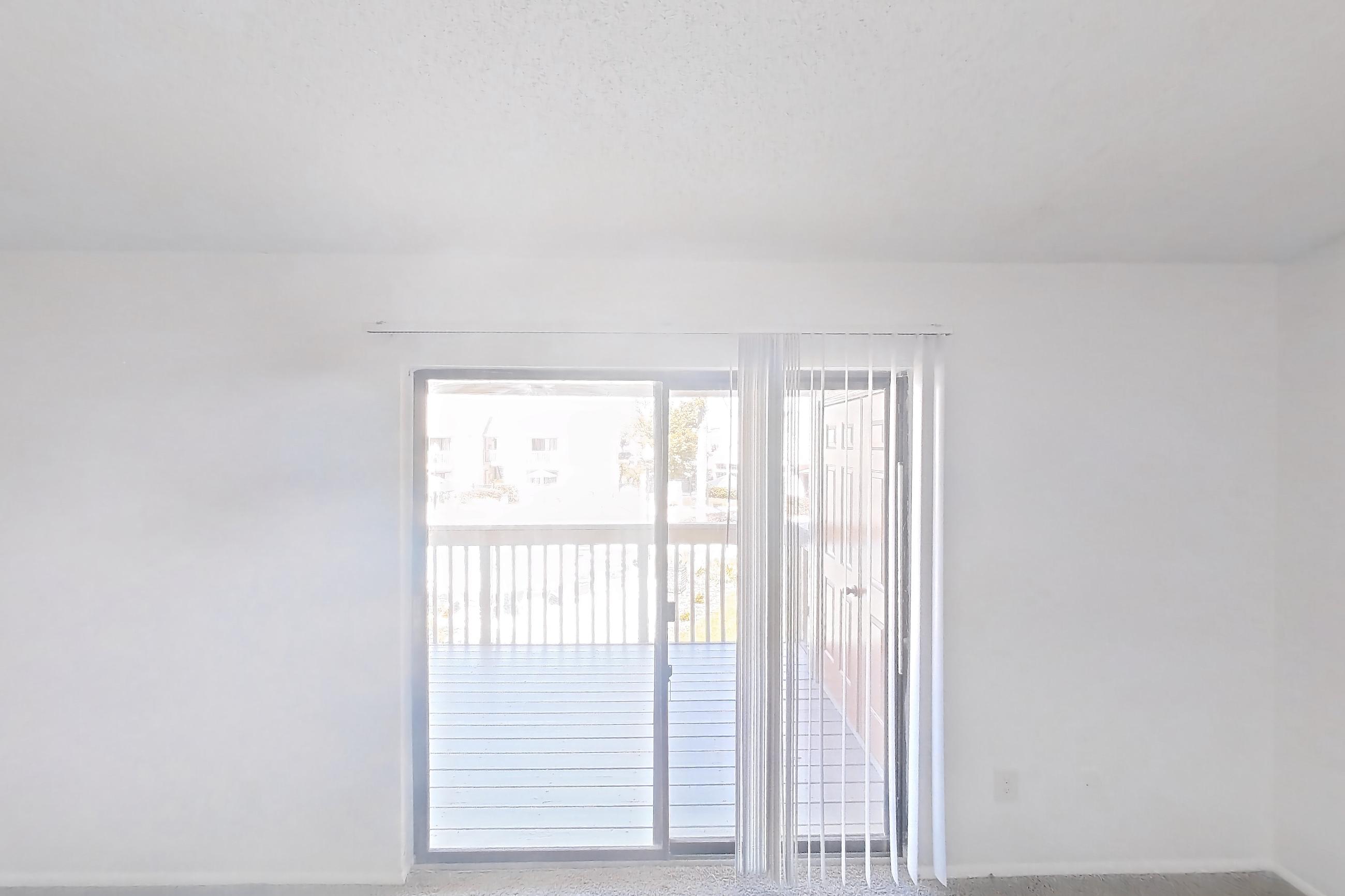 Living room with electric range, oven/range, and white appliances, Apartment 09-204 at St. James Crossing