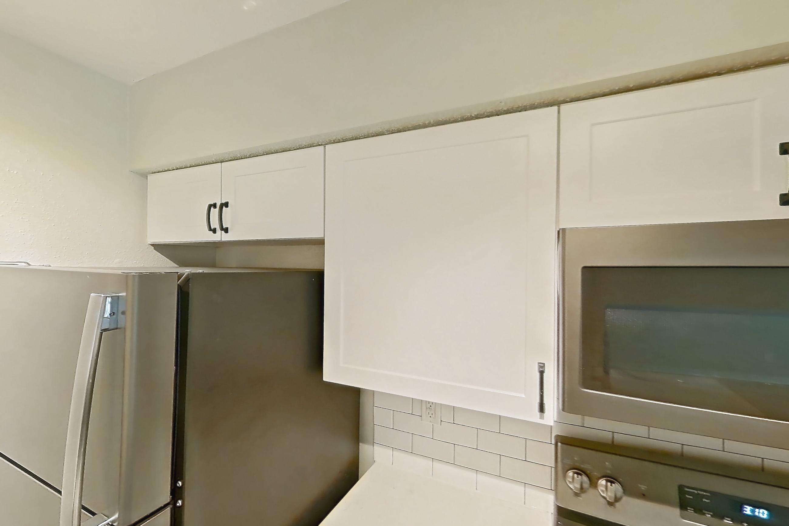 Kitchen in Apartment 04-204 at St. James Crossing, 1C floor plan