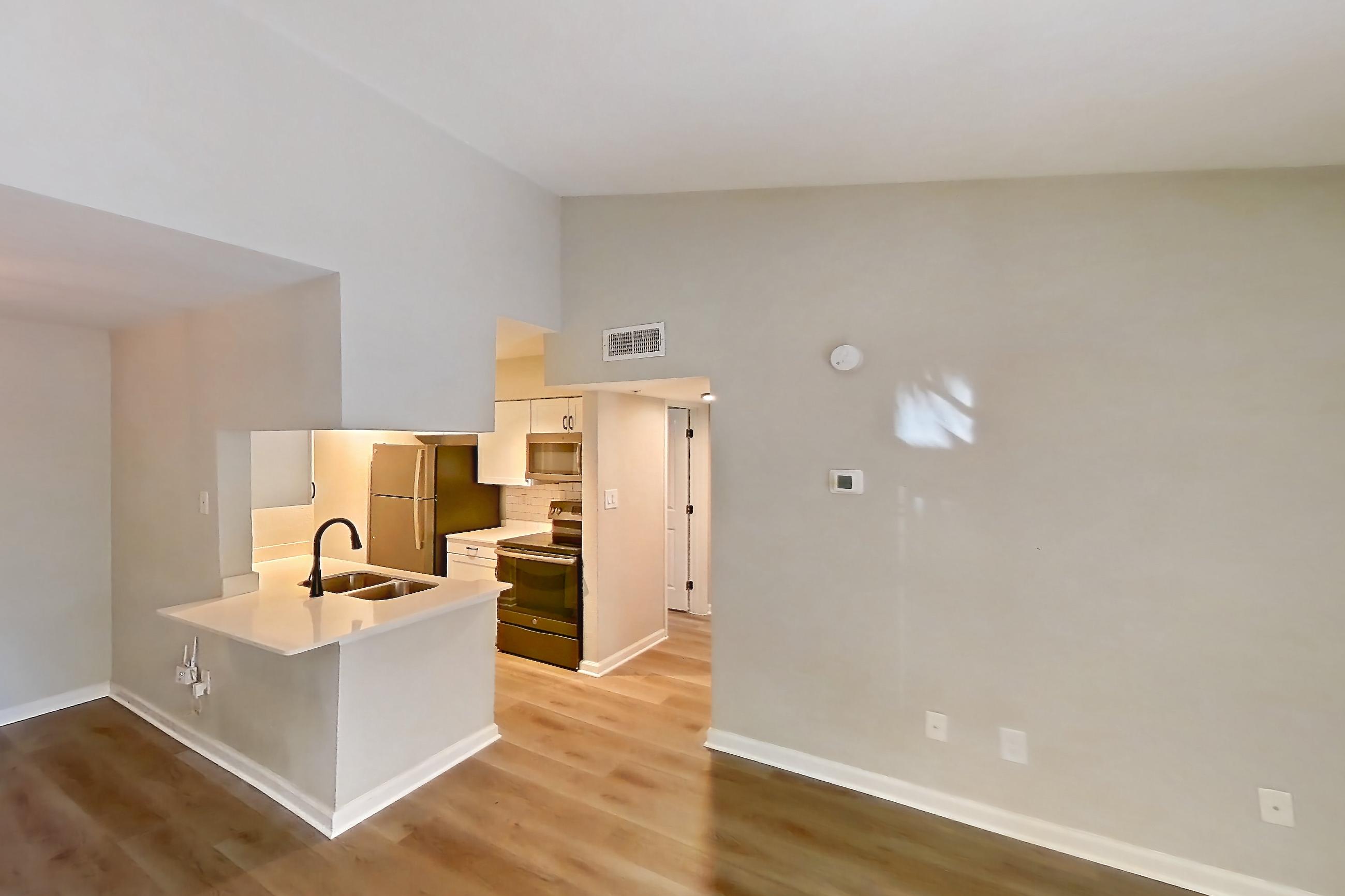 Living room in Apartment 04-204 at St. James Crossing, 1C floor plan