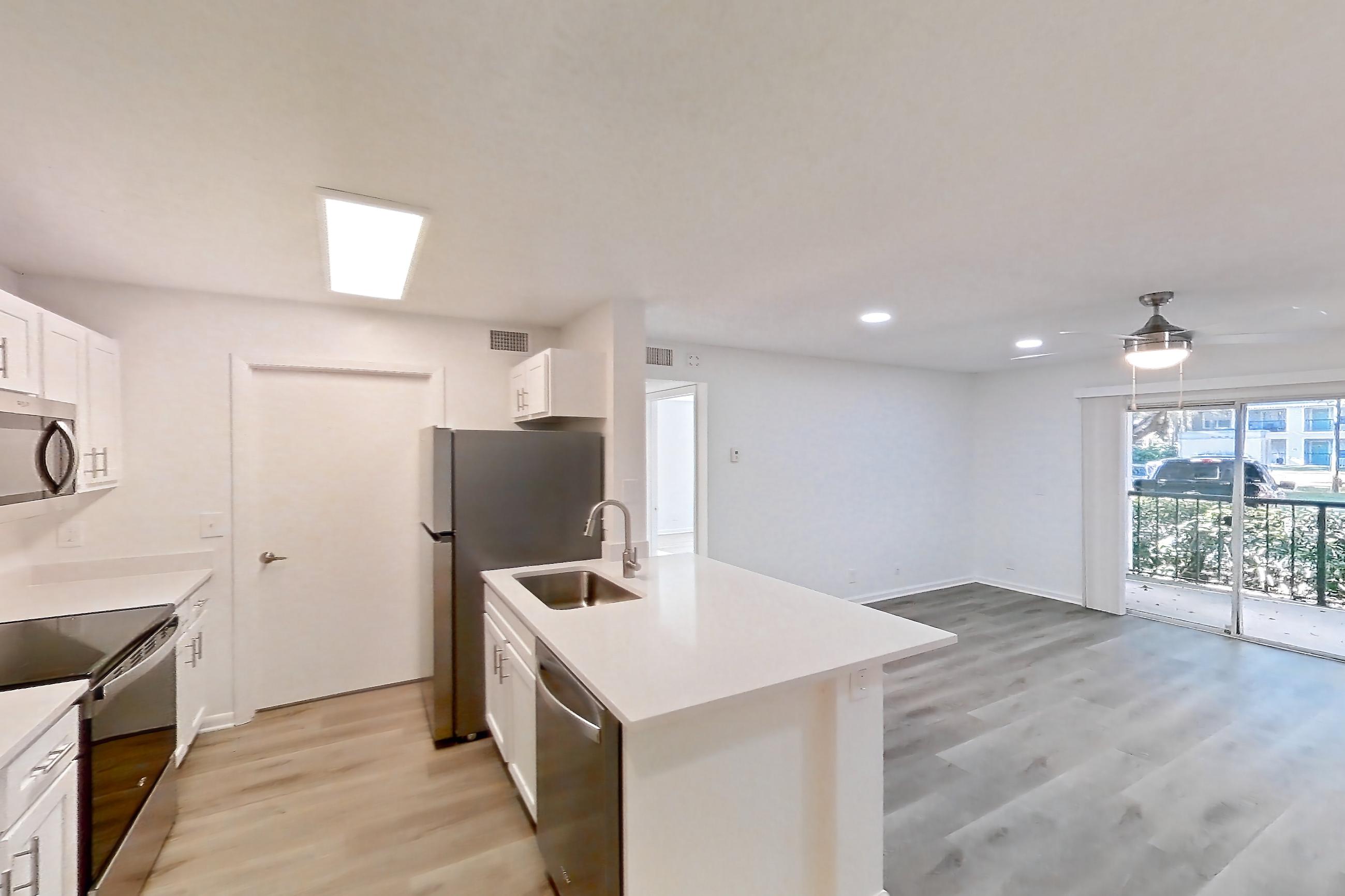 Living space in Apartment 1312 at Turtle Cove, 1B floor plan