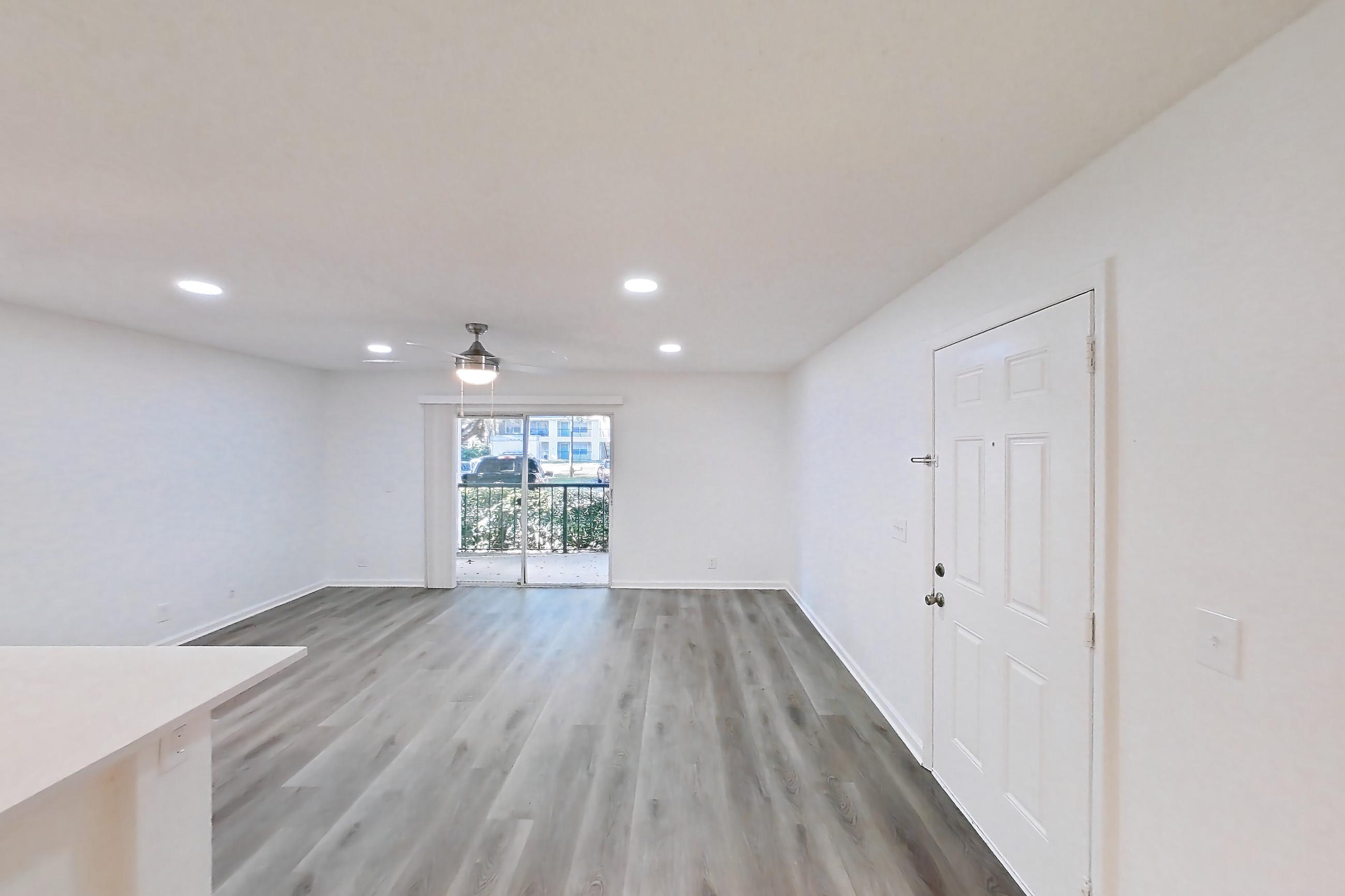 Living space in Apartment 1312 at Turtle Cove, 1B floor plan